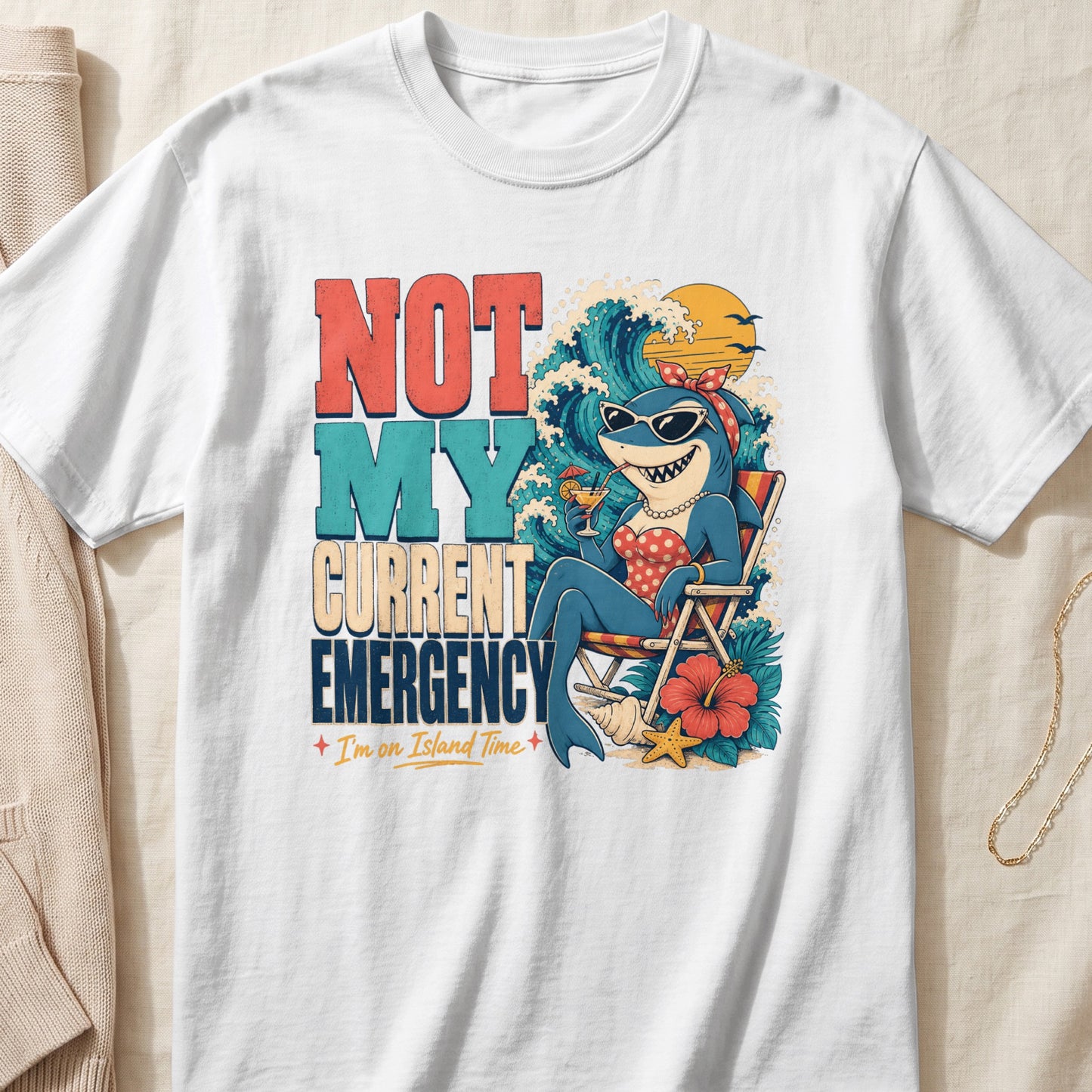 Shark in sunglasses relaxing on beach chair with text "Not My Current Emergency."