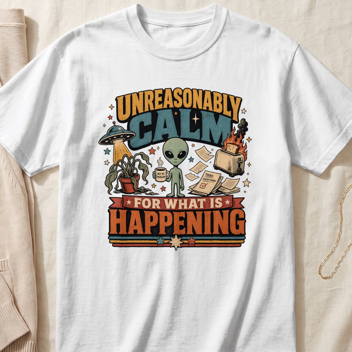 White t-shirt with vintage graphic "Unreasonably Calm For What Is Happening" alien.