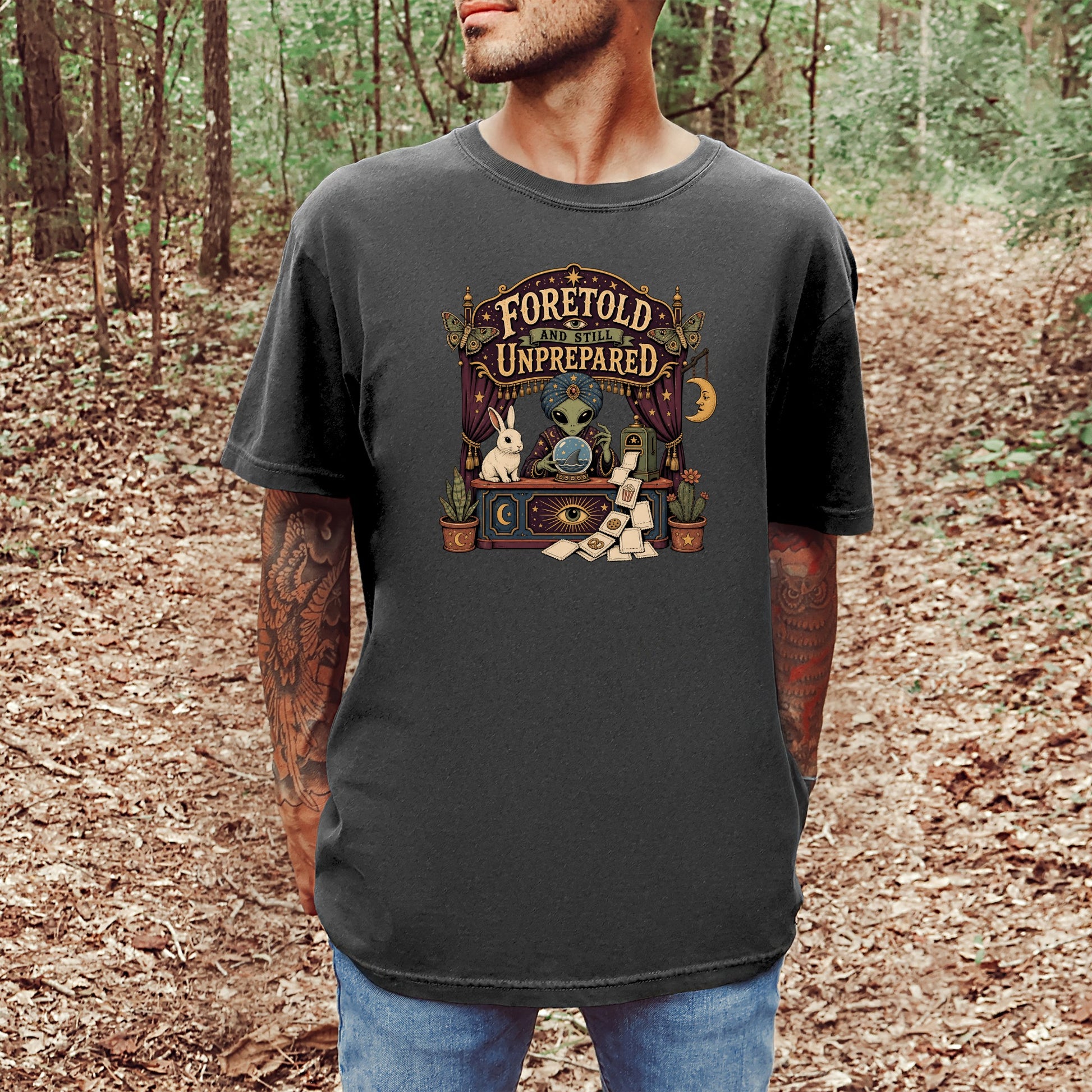 T-shirt with alien fortune teller, rabbit, and text "Foretold and Still Unprepared".
