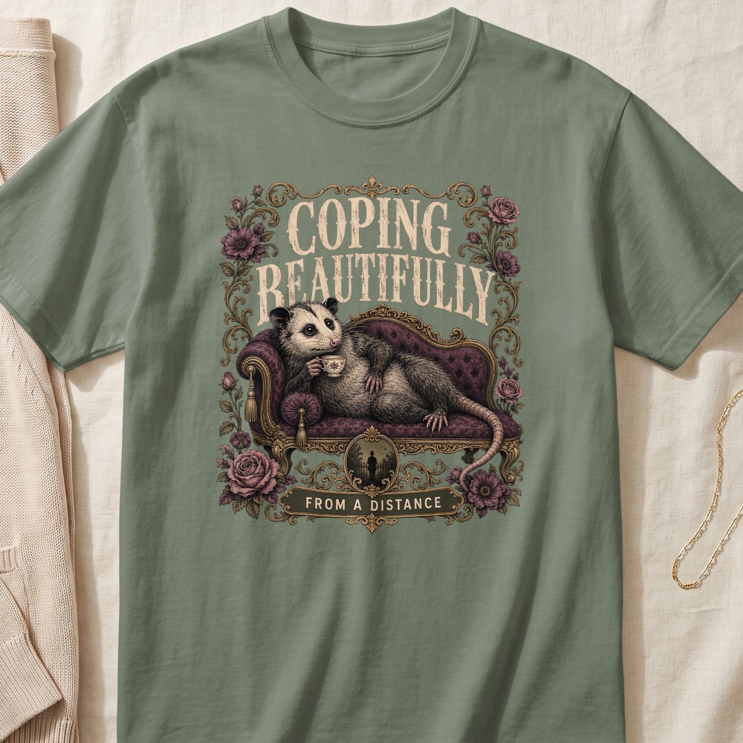 Opossum relaxing on a couch with tea, text reads "COPING BEAUTIFULLY FROM A DISTANCE".