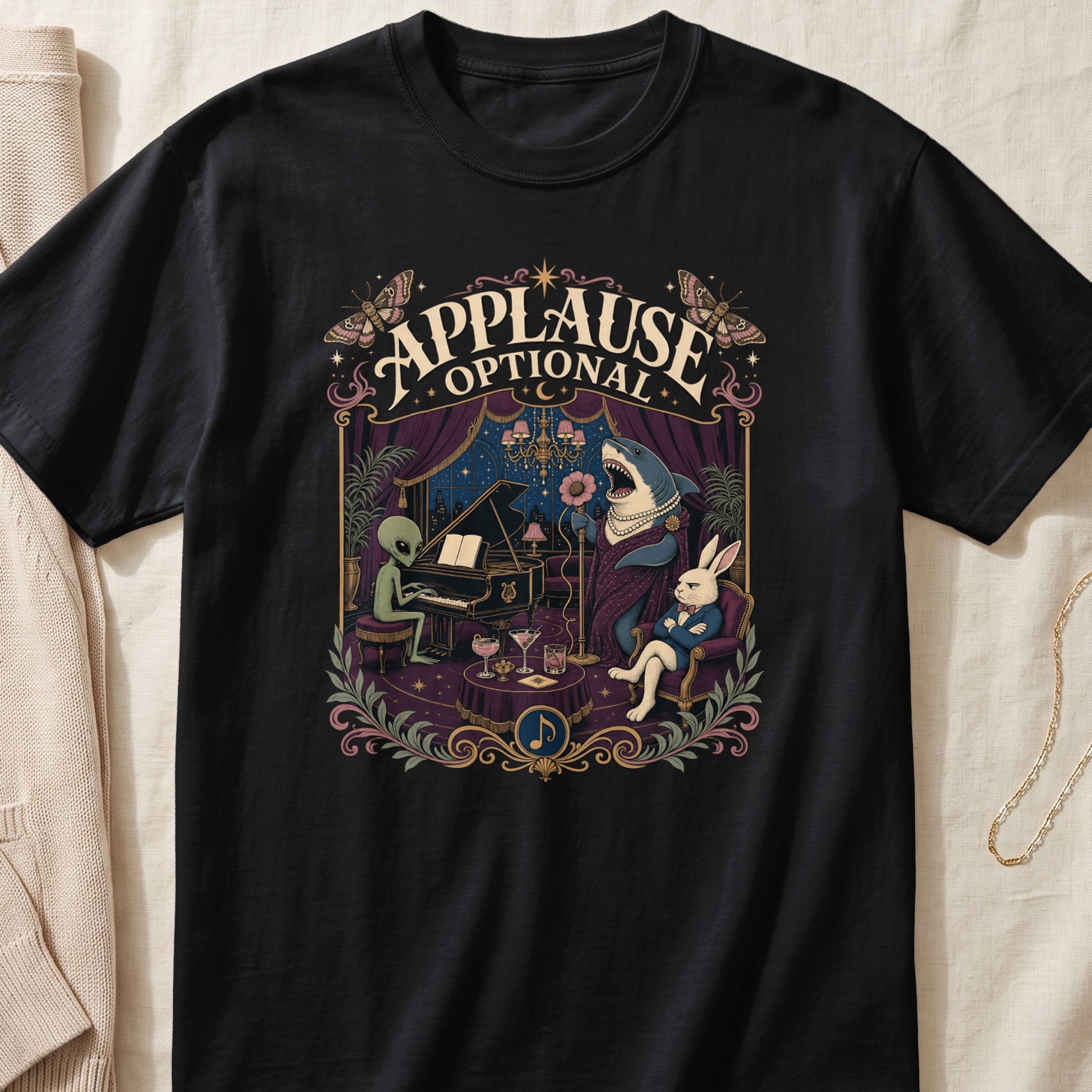 T-shirt graphic features an alien playing piano, a shark singing, and a rabbit listening.