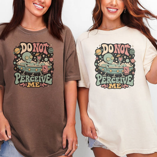 T-shirt graphic of alien in bathtub with text "DO NOT PERCEIVE ME".