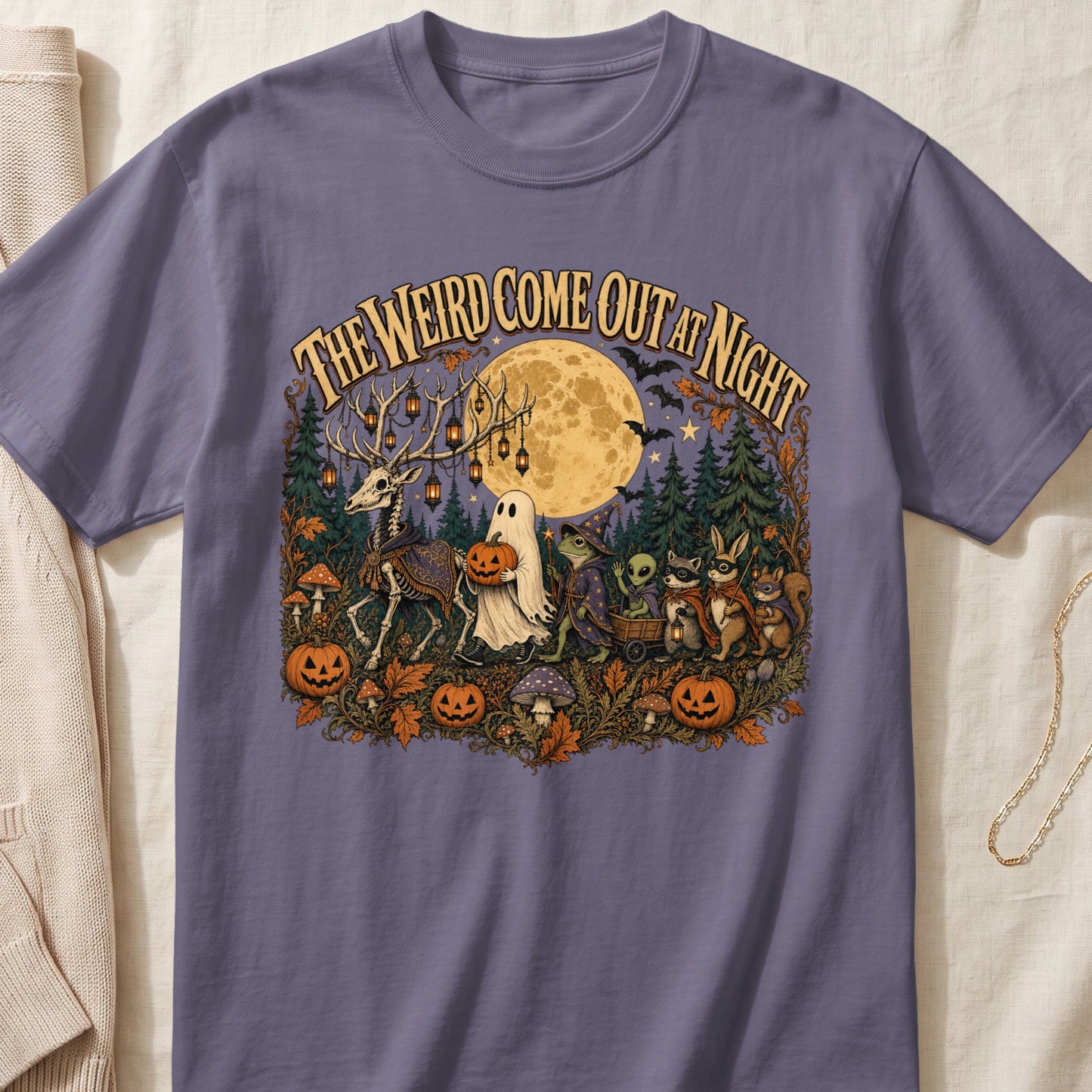 Skeleton deer, ghost, and forest creatures with "The Weird Come Out at Night" text.