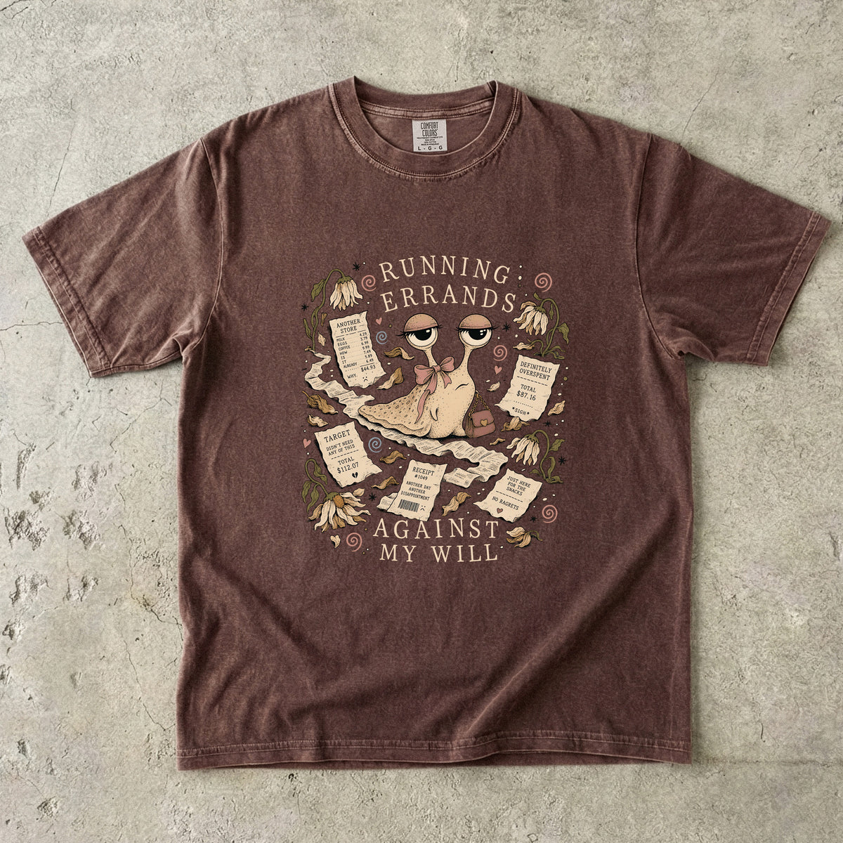 Brown t-shirt with illustration of snail saying "Running Errands Against My Will".