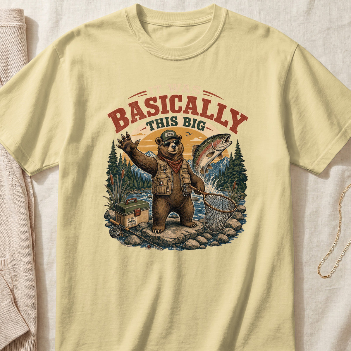 Bear fishing with a net, holding a rod, with a leaping trout and text "Basically This Big".