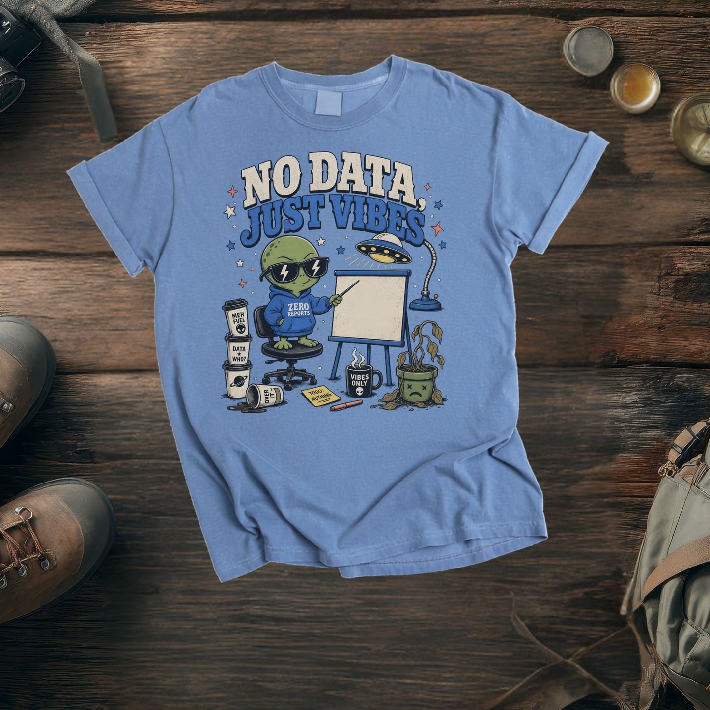 Blue t-shirt with an alien graphic saying "No Data, Just Vibes".
