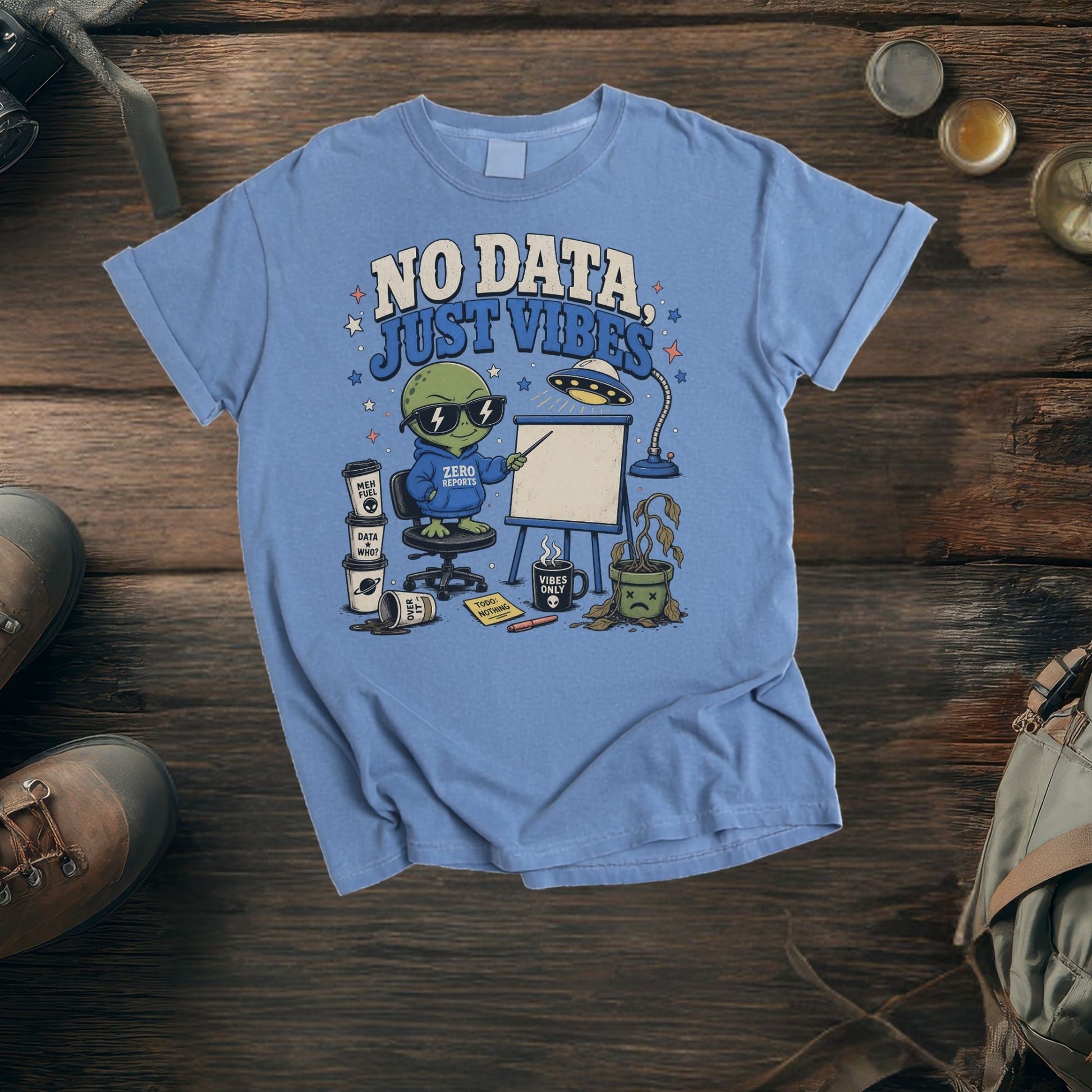 Blue t-shirt with an alien graphic saying "No Data, Just Vibes".