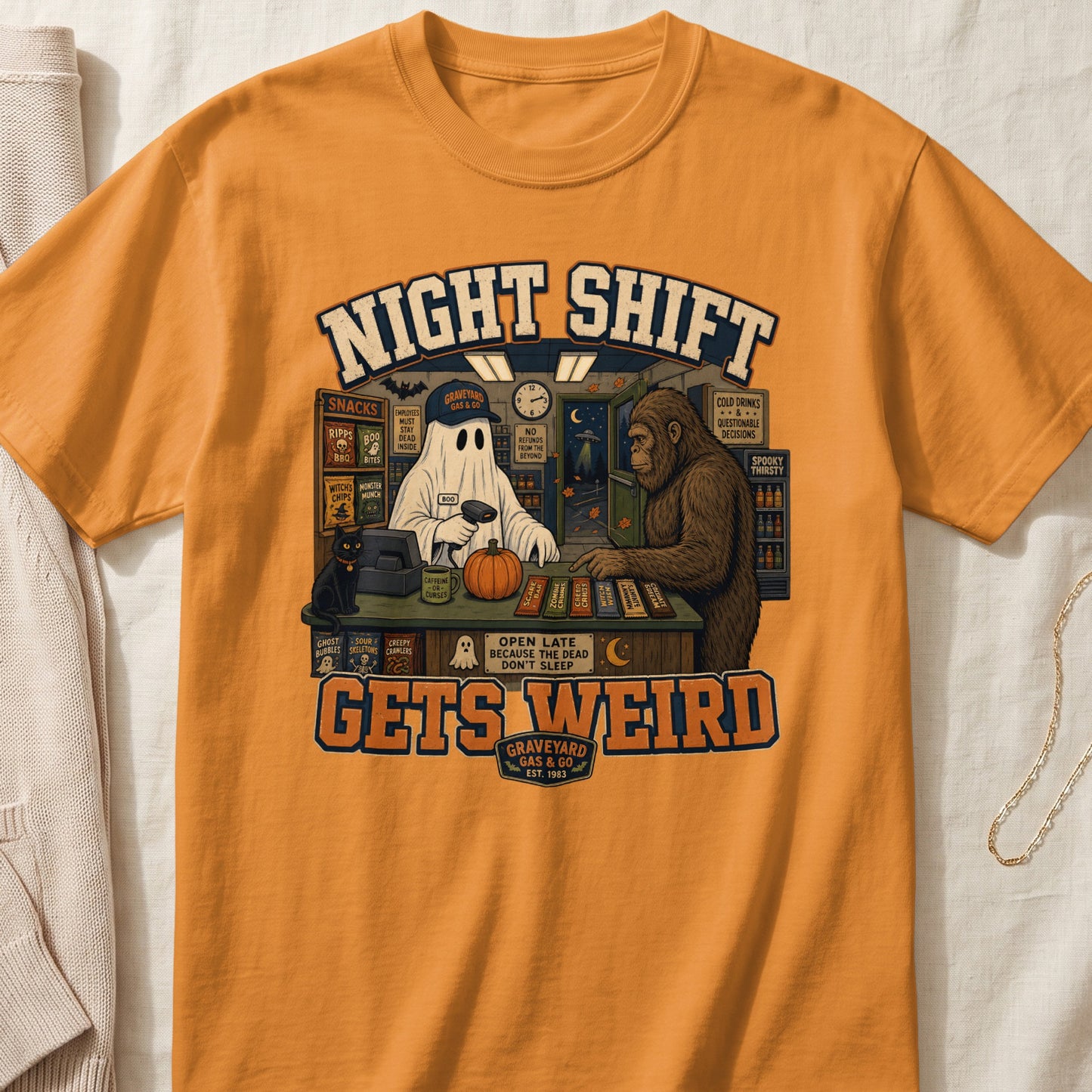 A ghost and Bigfoot work at Graveyard Gas & Go, with text "Night Shift Gets Weird".