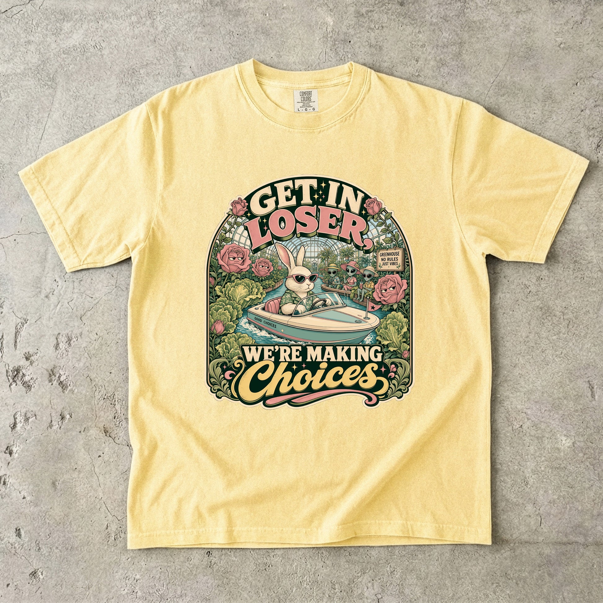 Yellow t-shirt graphic with text "GET IN LOSER. WE'RE MAKING Choices."