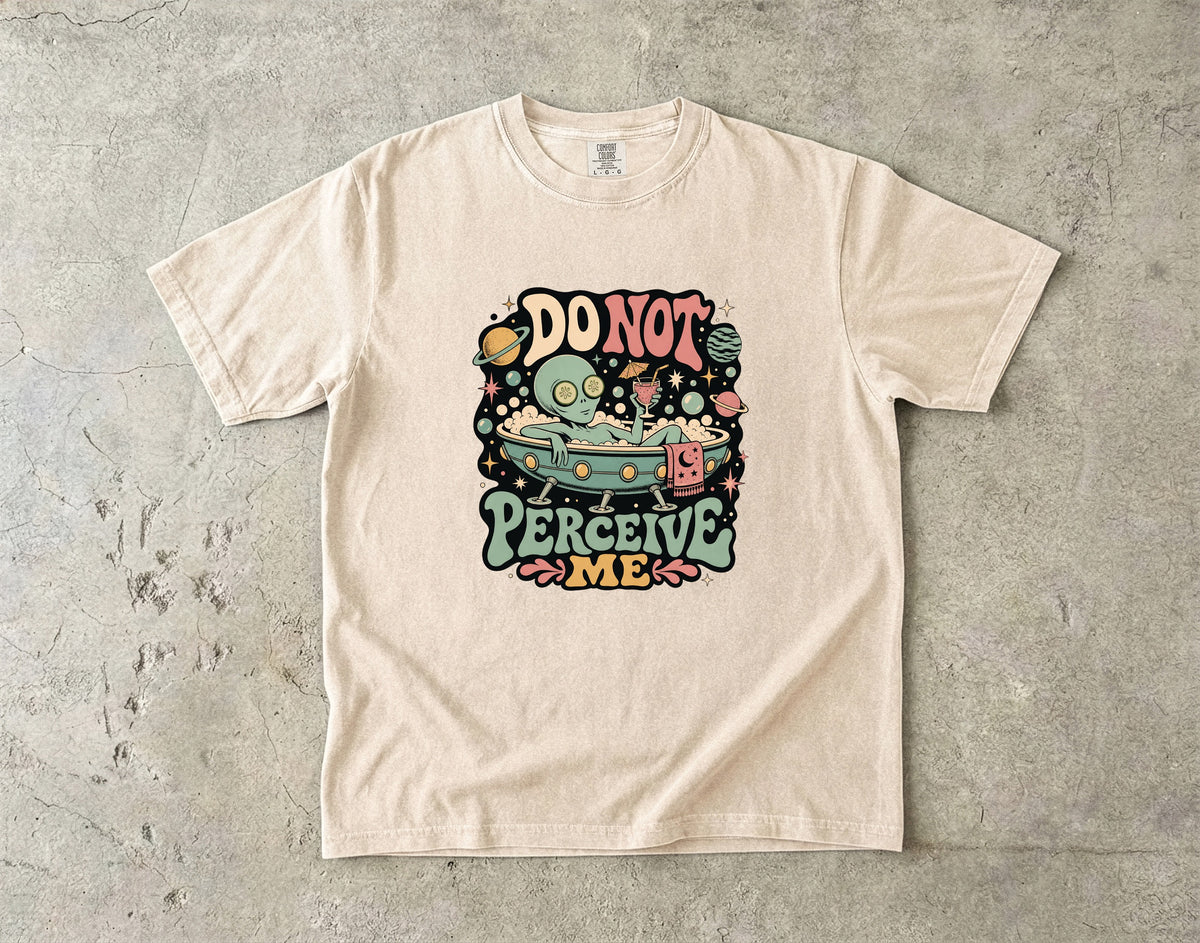 T-shirt with alien in bathtub graphic and text "DO NOT PERCEIVE ME".