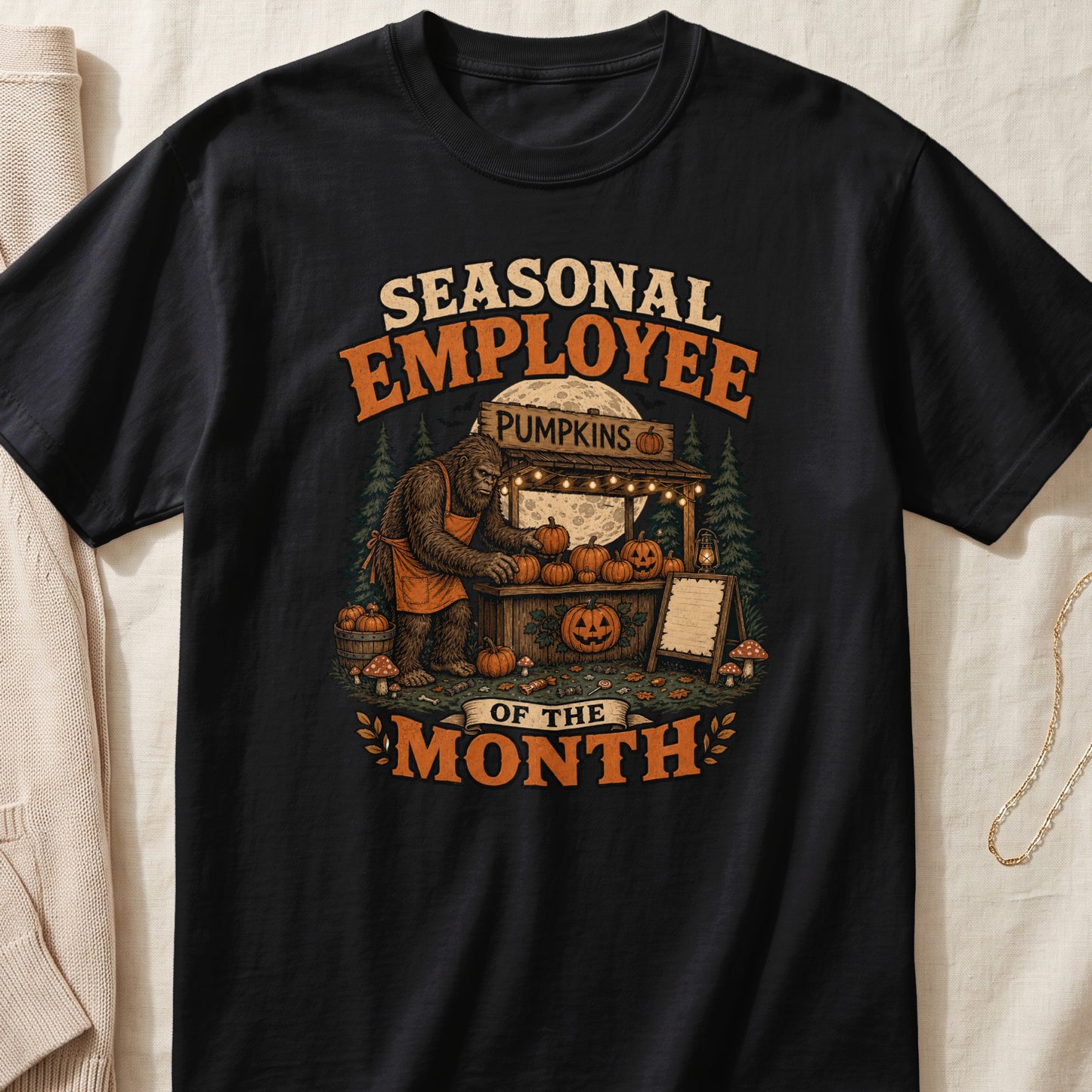 Bigfoot at pumpkin stand with text "Seasonal Employee of the Month".