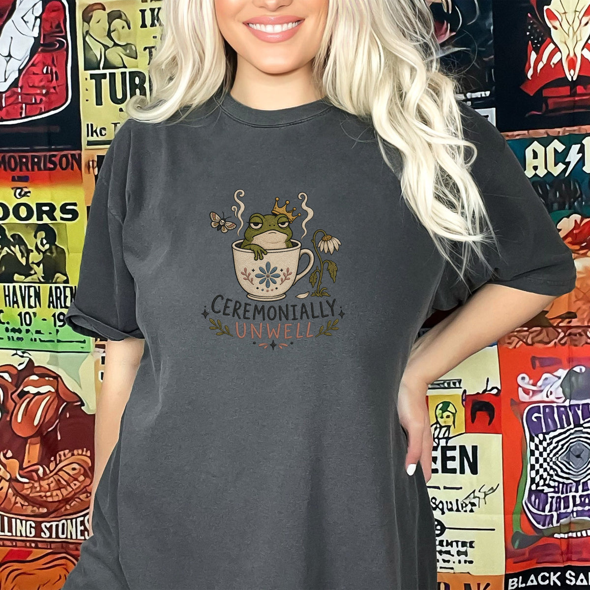 T-shirt with a design of a crowned frog in a teacup saying "Ceremonially Unwell."