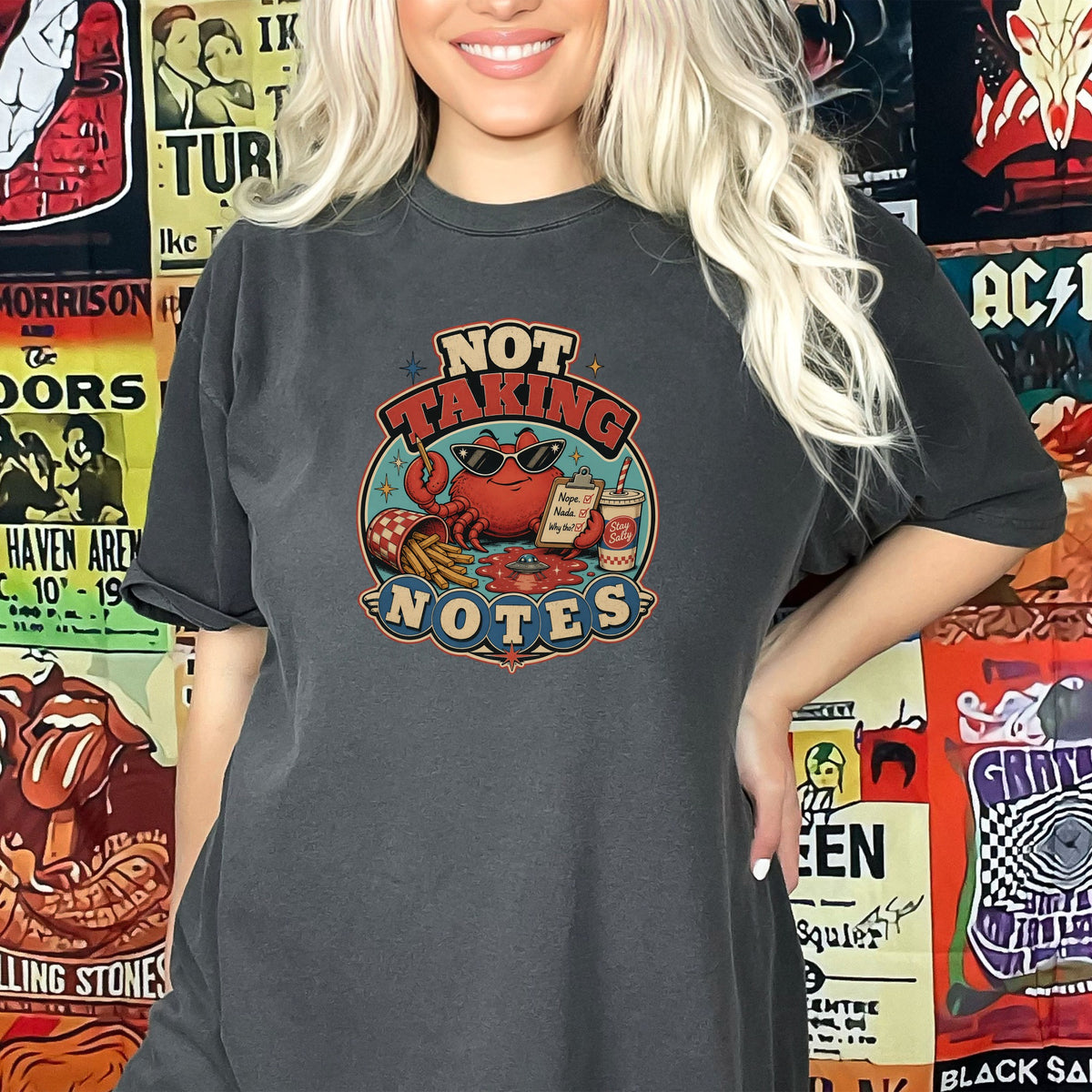 Dark t-shirt with "NOT TAKING NOTES" graphic featuring a crab, fries, and drink.