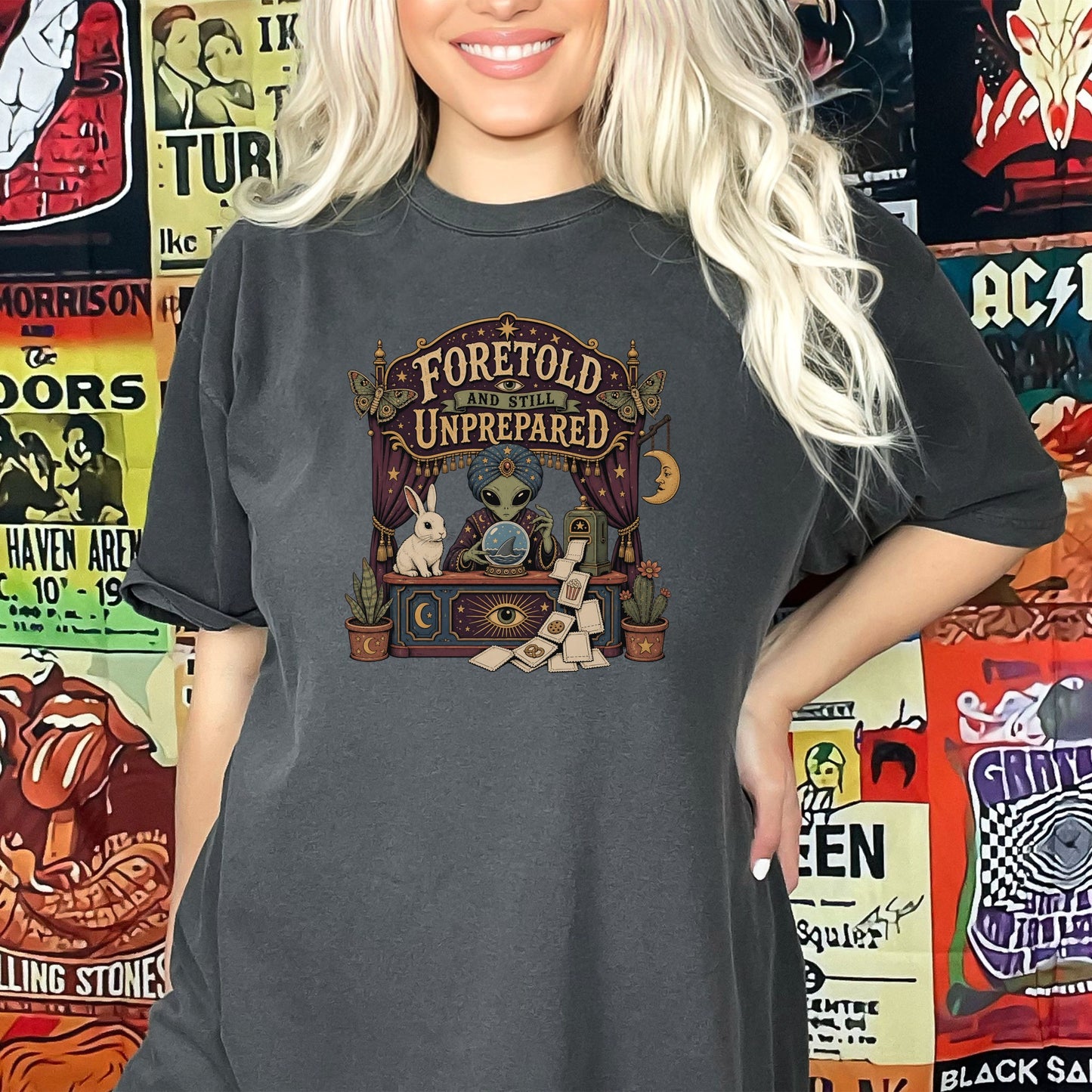 T-shirt graphic with alien fortune teller, rabbit, and text "Foretold and Still Unprepared".