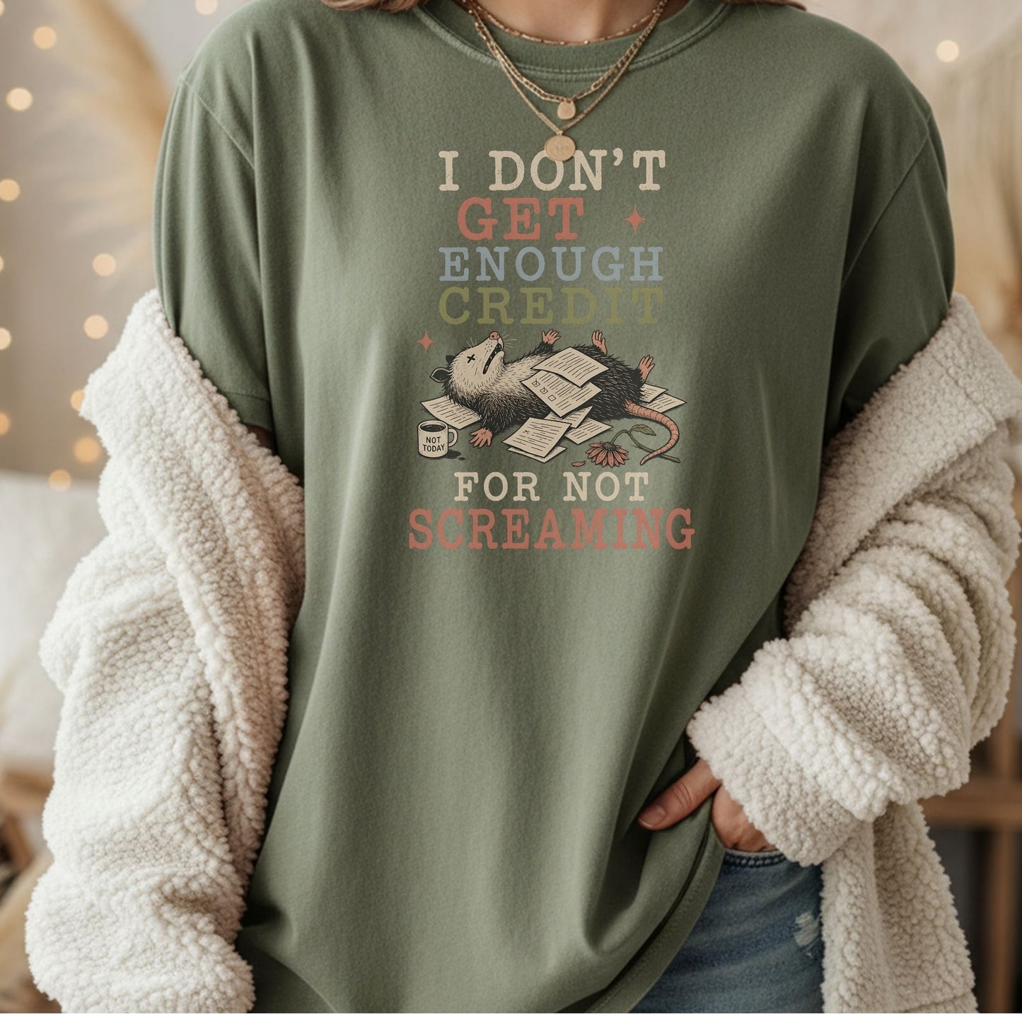 T-shirt graphic: opossum on papers, "I don't get enough credit for not screaming."