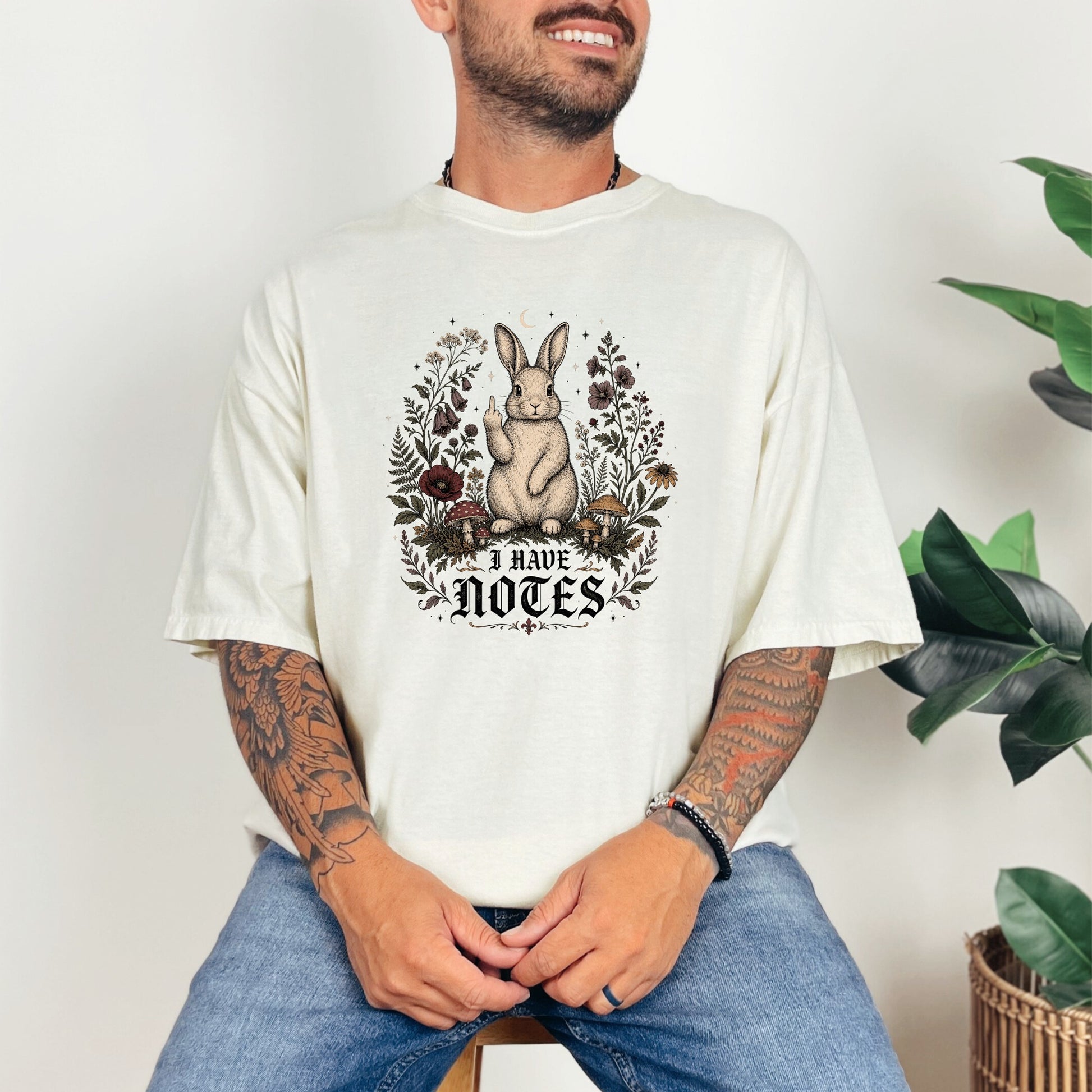 T-shirt with a rabbit giving middle finger and text "I HAVE NOTES".