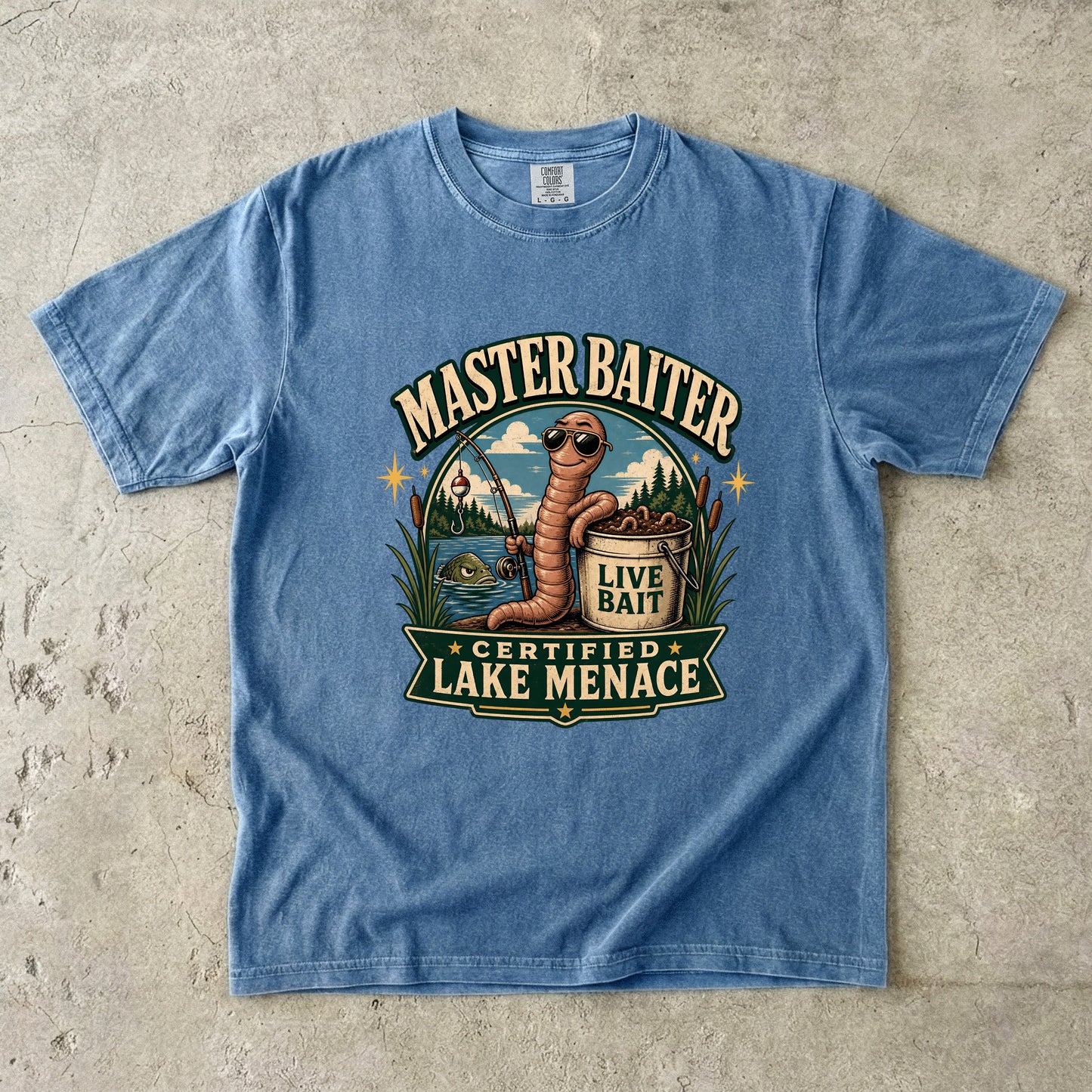 Blue t-shirt with "Master Baiter" graphic of a worm with sunglasses holding a fishing rod.