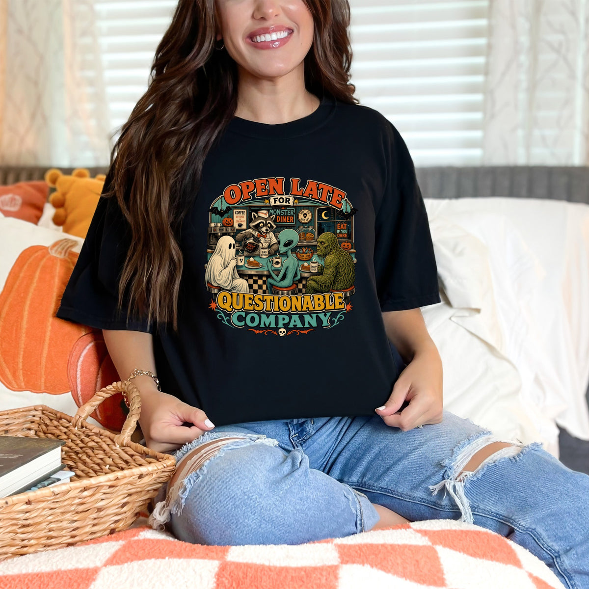 T-shirt graphic: "Open Late For Monster Diner", featuring aliens, ghosts, and monsters.