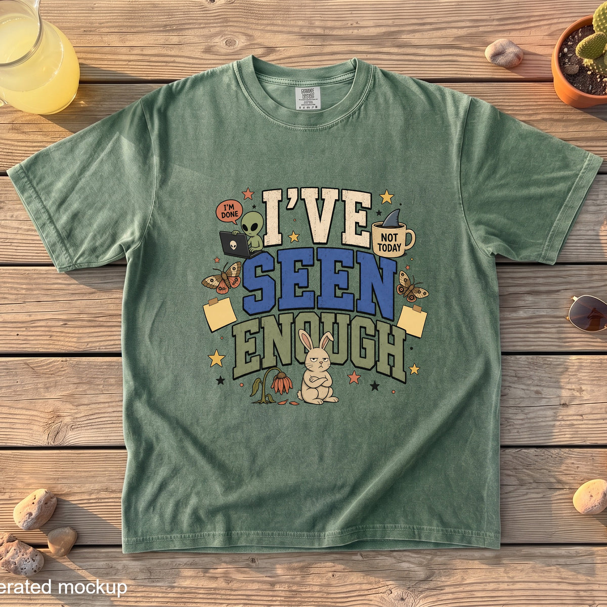 Green t-shirt with "I'VE SEEN ENOUGH" text and cartoon graphics.