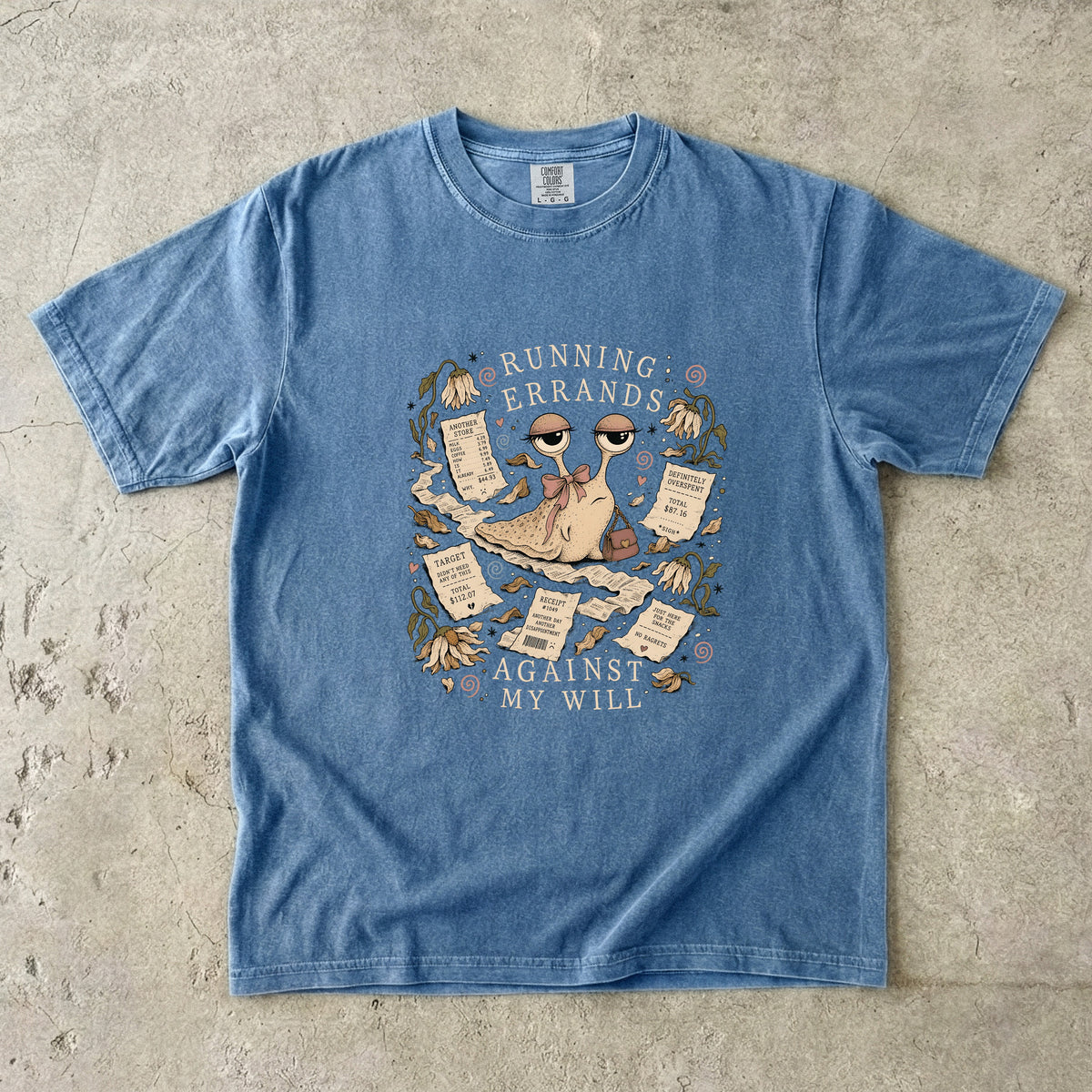 Blue t-shirt with a graphic of a snail surrounded by receipts and text.