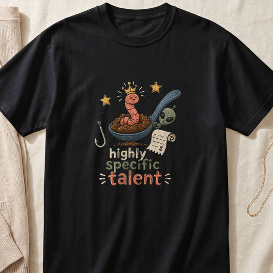 Black t-shirt with embroidery of a crowned worm in a spoon with an alien and a bill.
