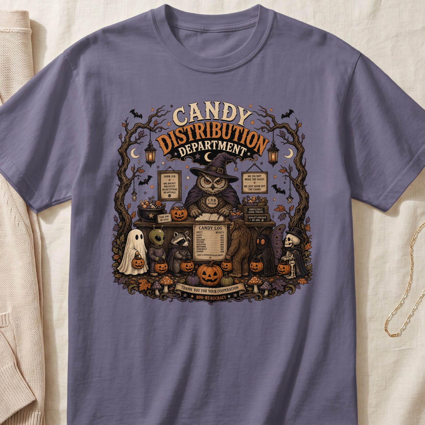 Halloween candy distribution department graphic with owl, ghost, alien, raccoon, bigfoot, mothman, and skeleton.