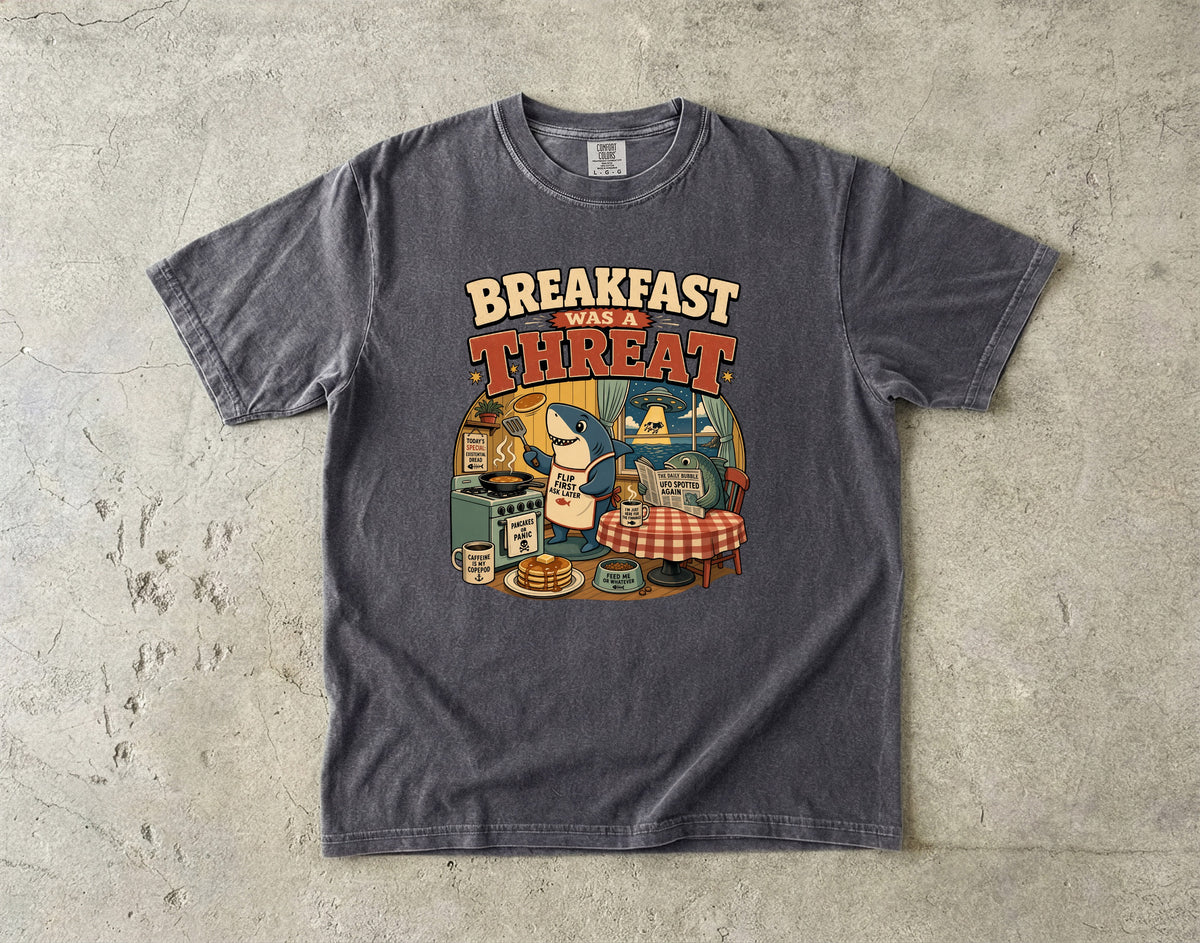 Shark making breakfast with text "BREAKFAST WAS A THREAT".
