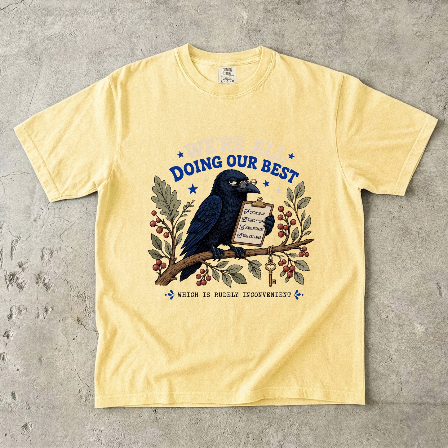 Yellow t-shirt with a raven wearing glasses holding a clipboard with checklist items.