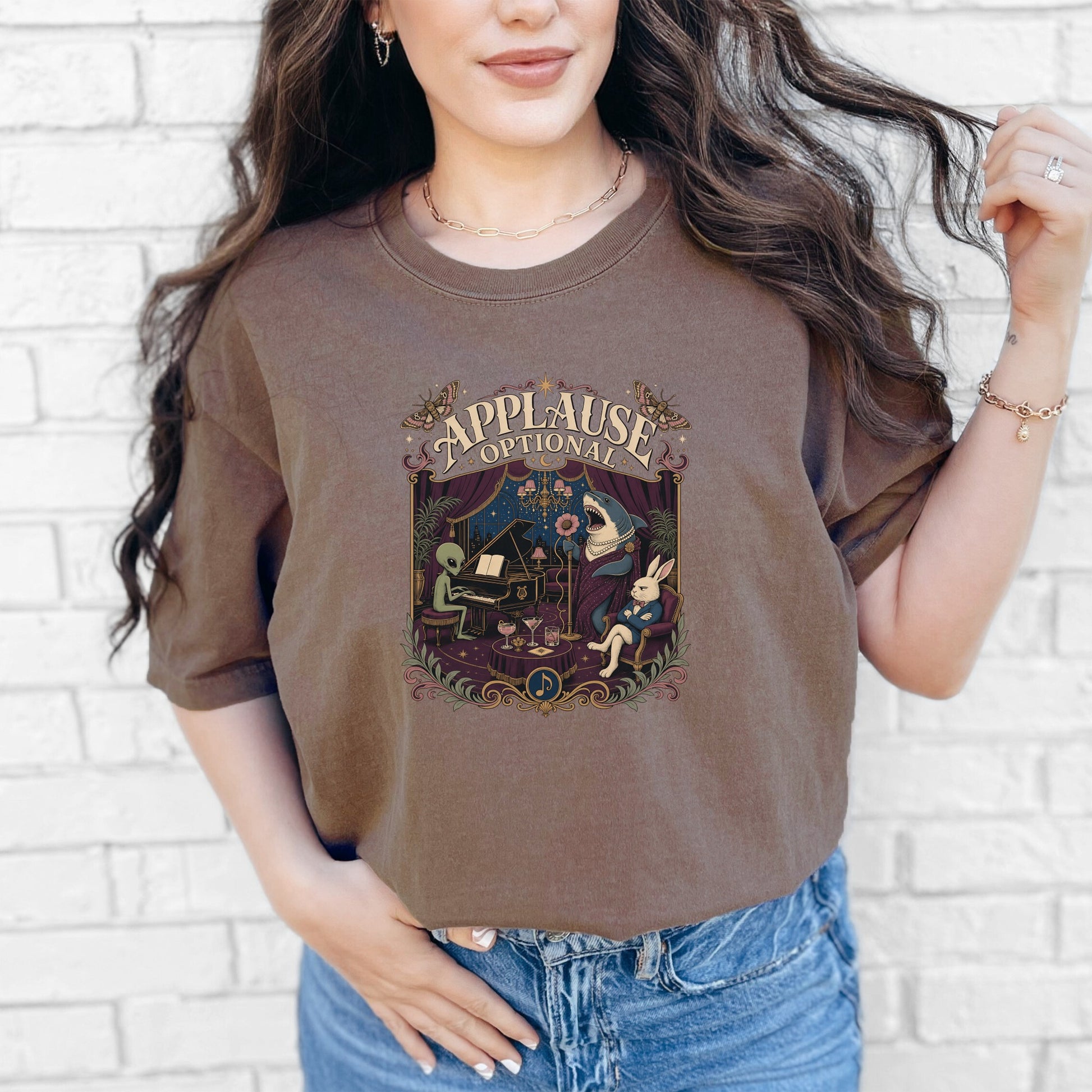 T-shirt with "Applause Optional" graphic of an alien at a piano and a shark singing.