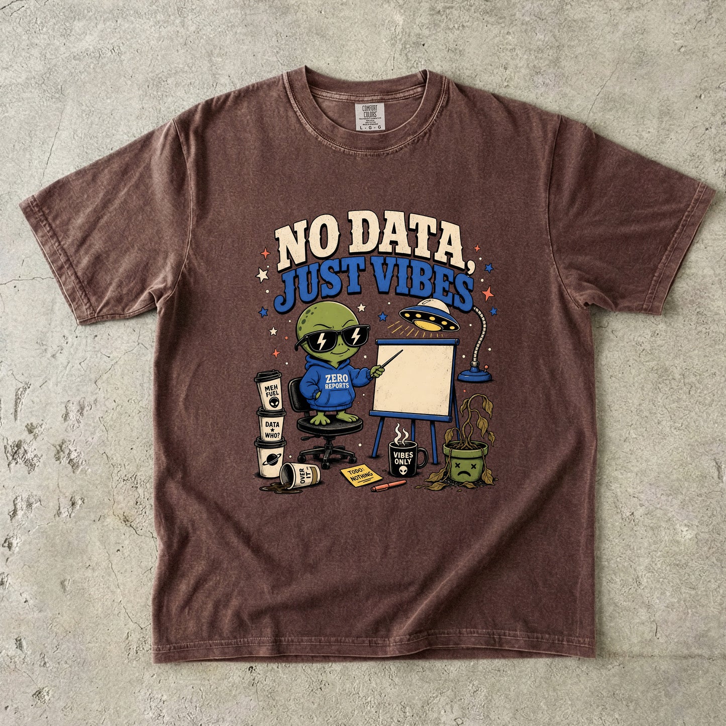 Brown t-shirt with alien graphic: "NO DATA, JUST VIBES" and "ZERO REPORTS".