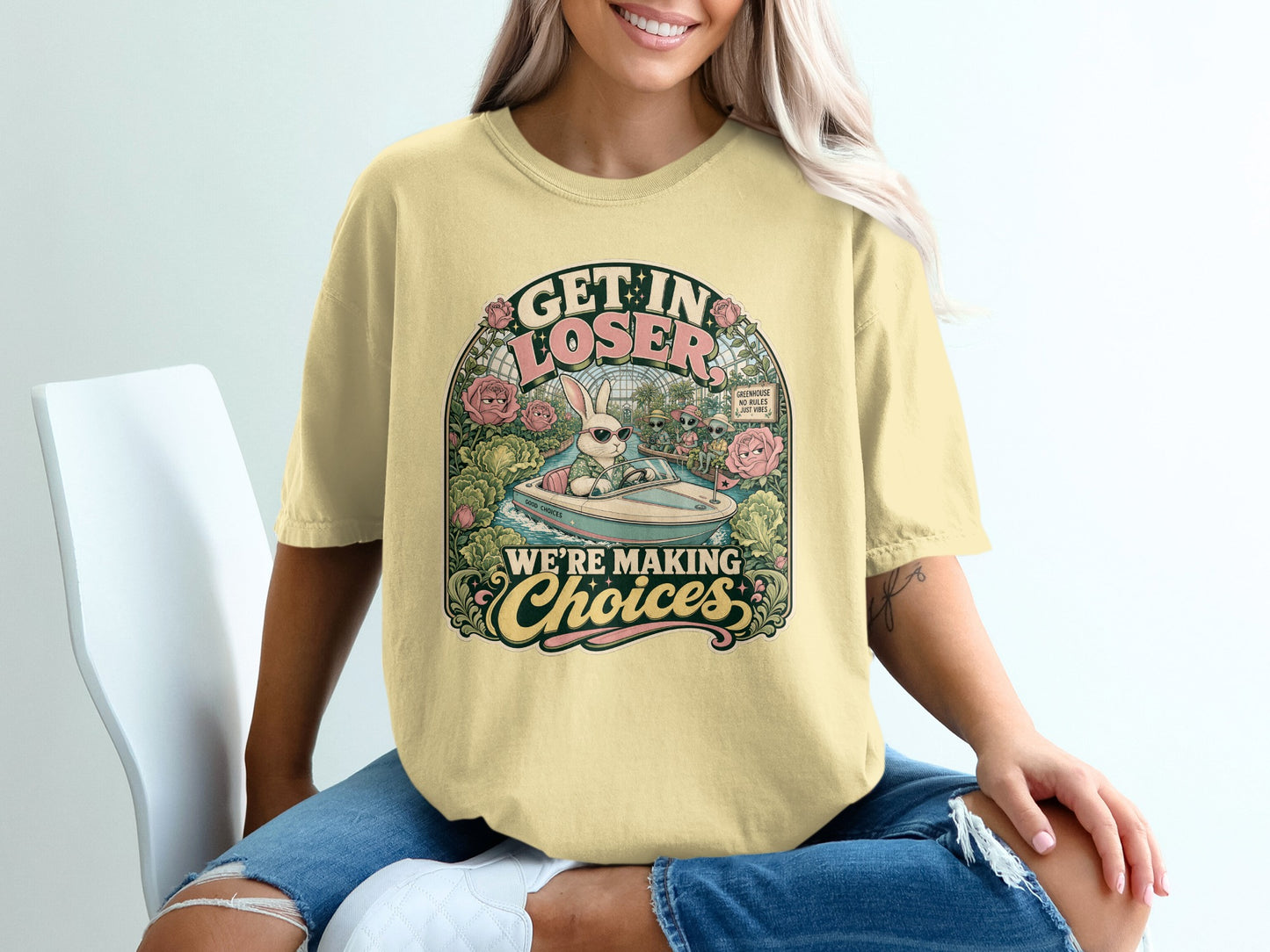 T-shirt graphic with rabbit in boat and text "GET IN LOSER WE'RE MAKING CHOICES".