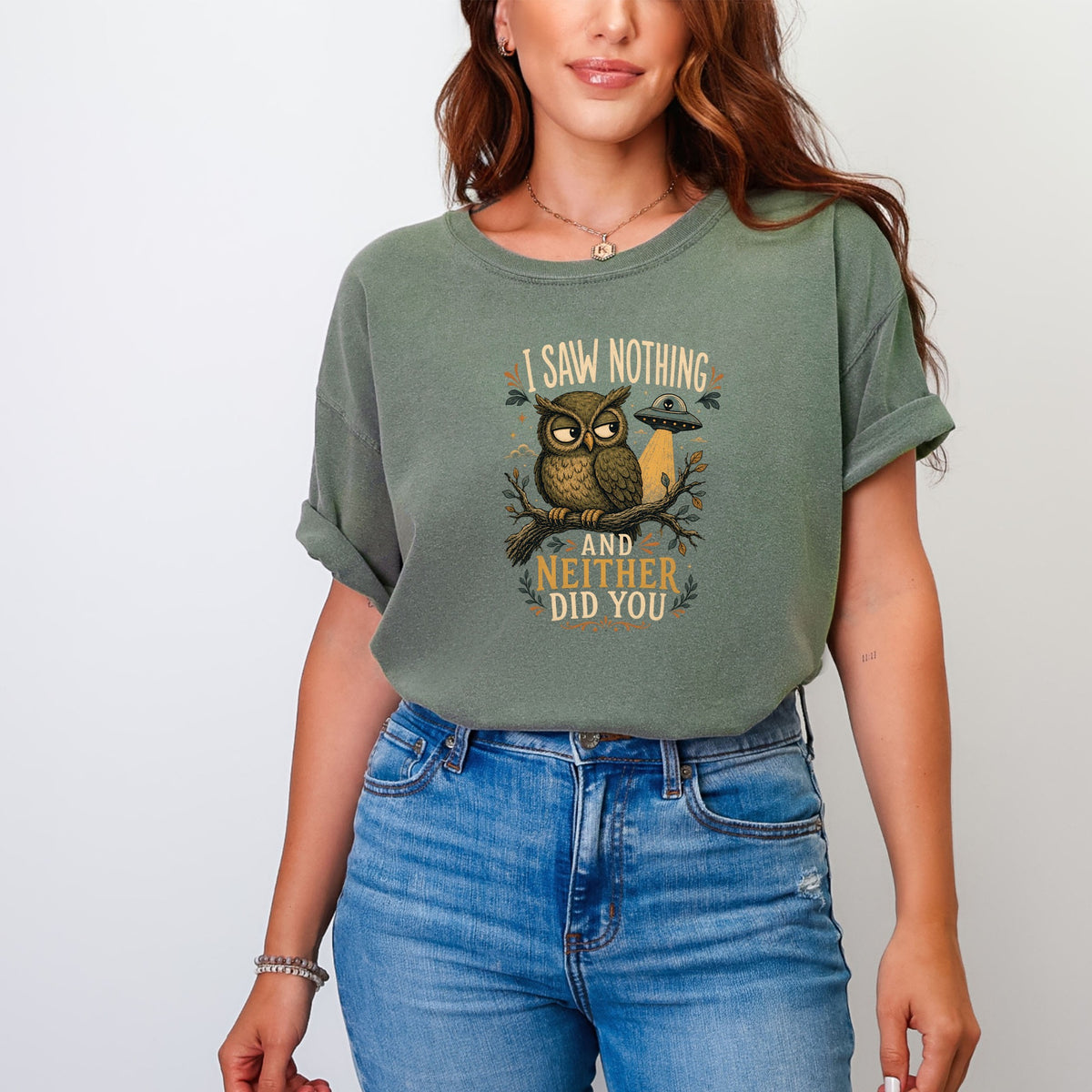 Green t-shirt with owl, UFO, and text "I saw nothing and neither did you".