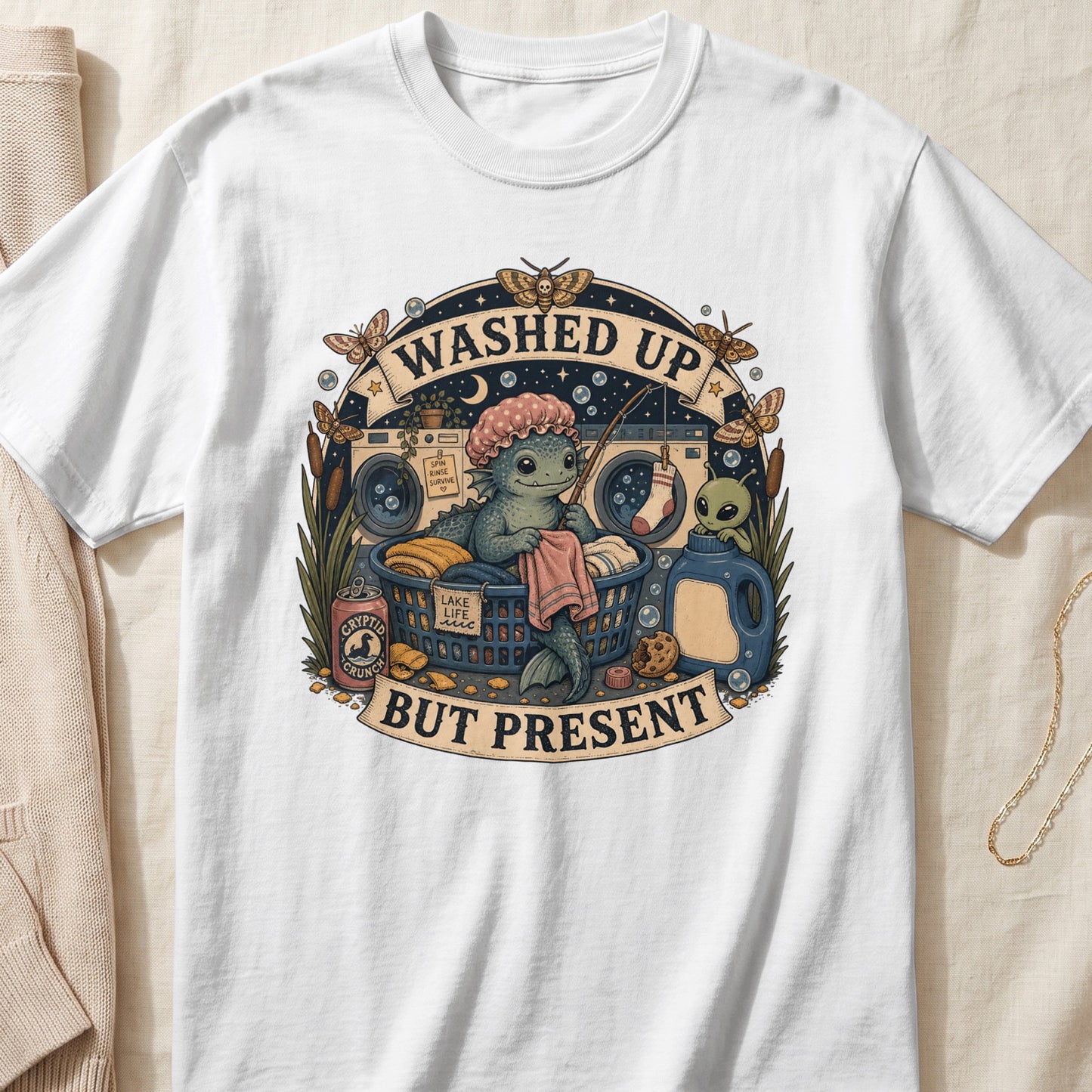 Illustration of a creature doing laundry with text "Washed Up But Present".