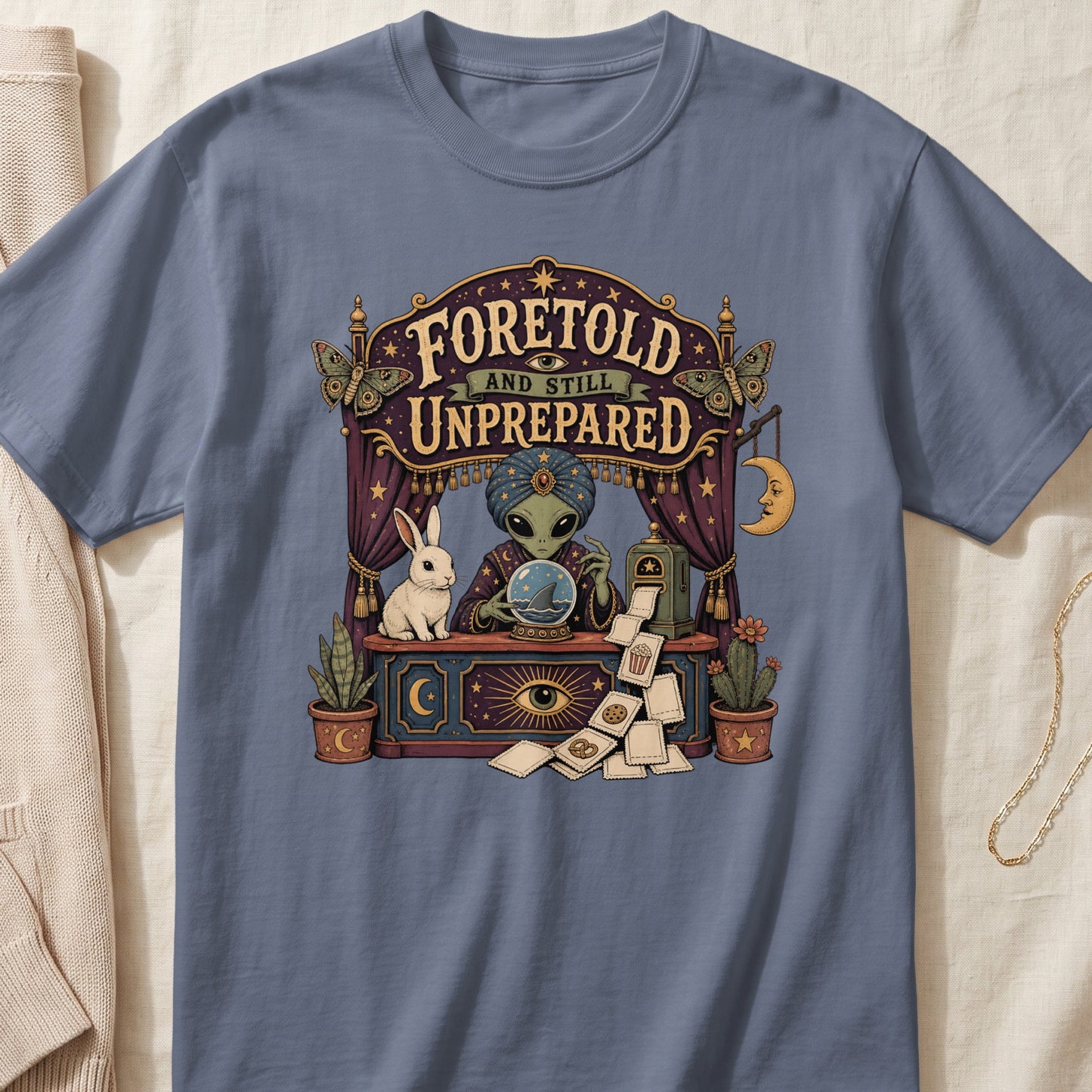 Alien fortune teller with crystal ball and text "Foretold and Still Unprepared".