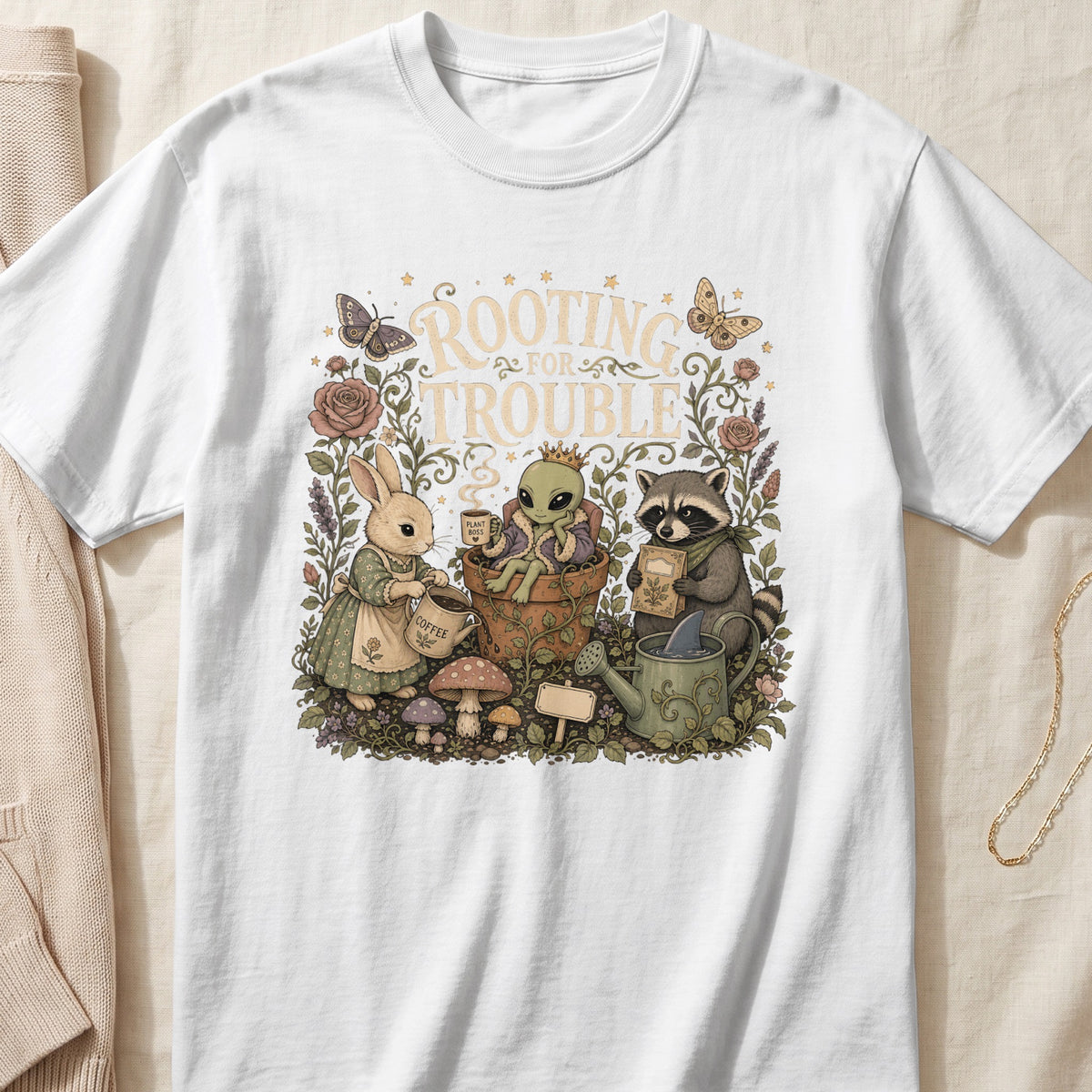 Rabbit, alien, and raccoon tending a garden with text "Rooting For Trouble".