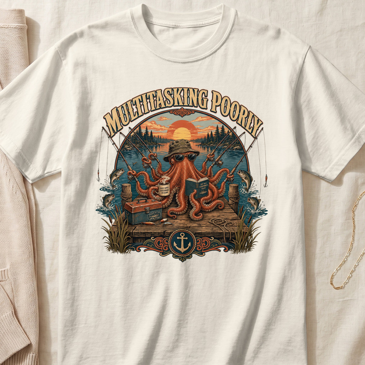 Off-white t-shirt featuring an illustration of an octopus fishing on a dock with the text Multitasking Poorly.