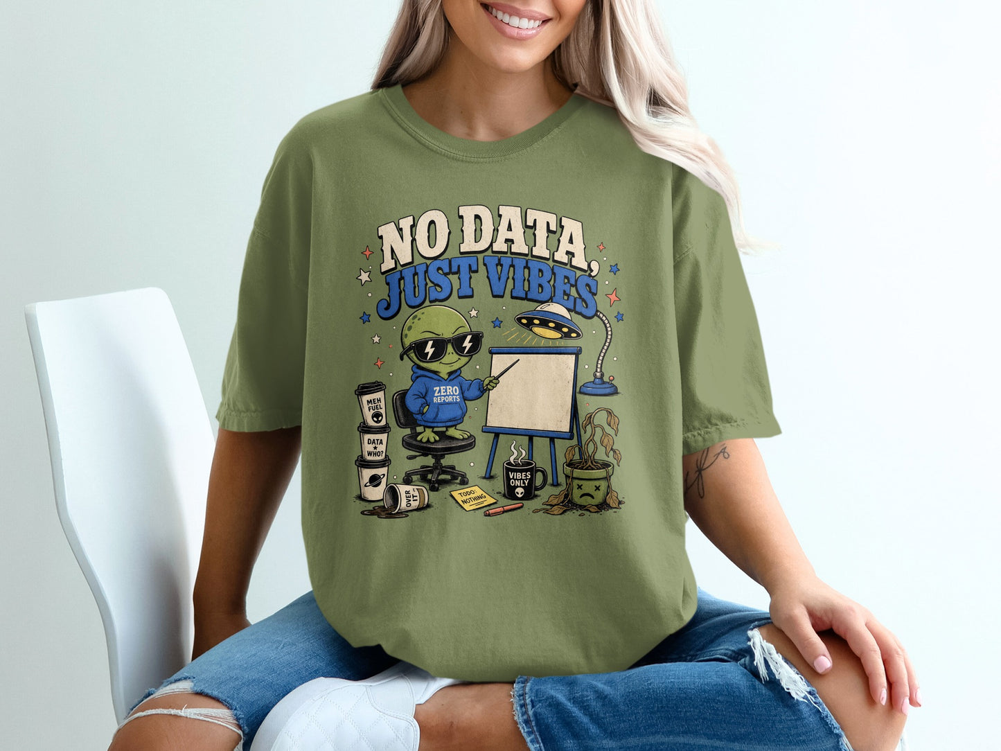 Green t-shirt with "No Data, Just Vibes" and an alien presenting with coffee cups.