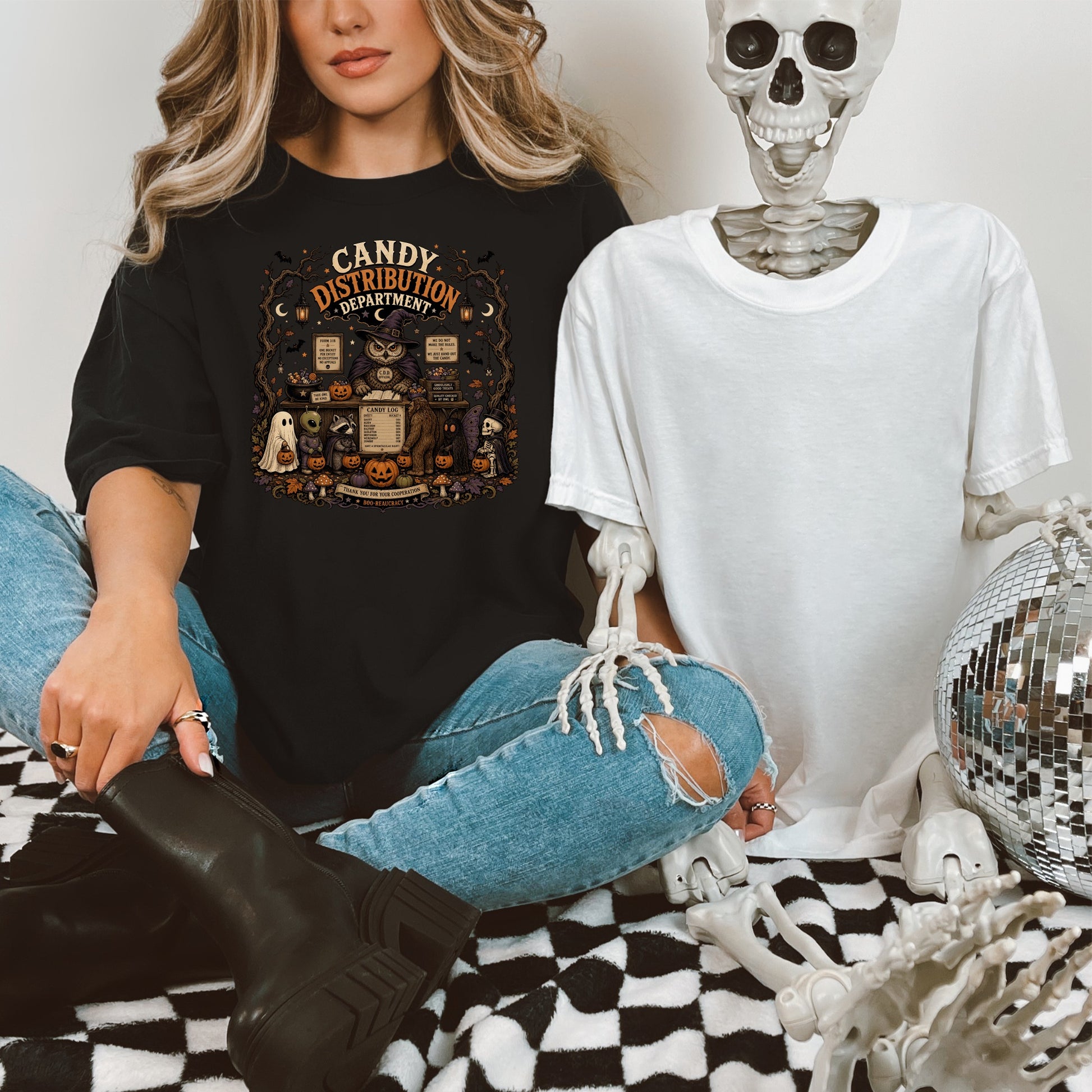 Black t-shirt with "Candy Distribution Department" Halloween graphic and owl.
