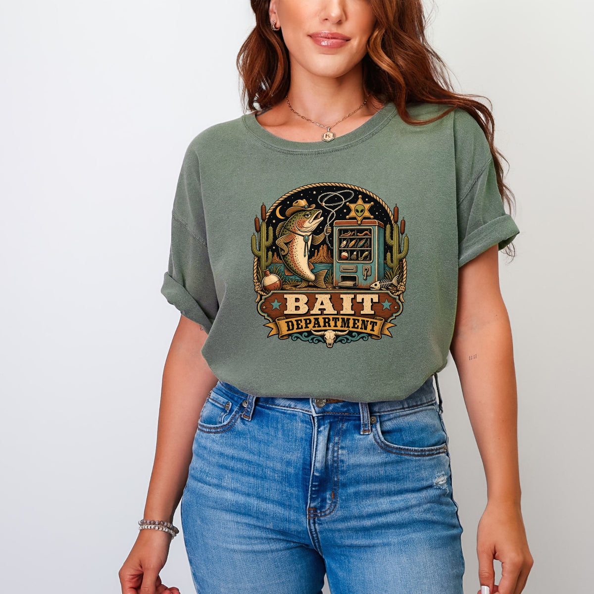 Green t-shirt featuring a graphic with a fish, a bait machine, and text that reads "Bait Department."
