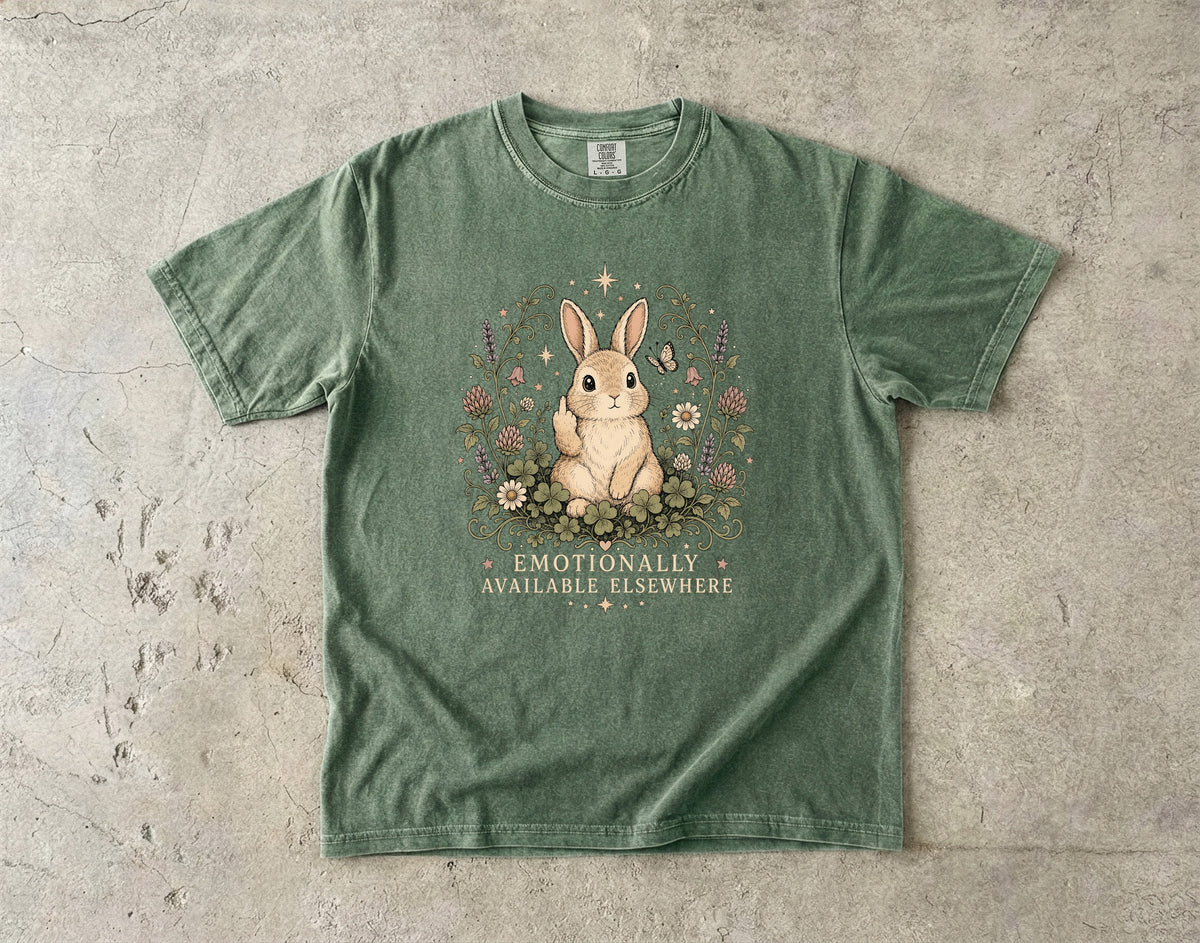 Green t-shirt with a rabbit flipping middle finger and text "Emotionally Available Elsewhere".