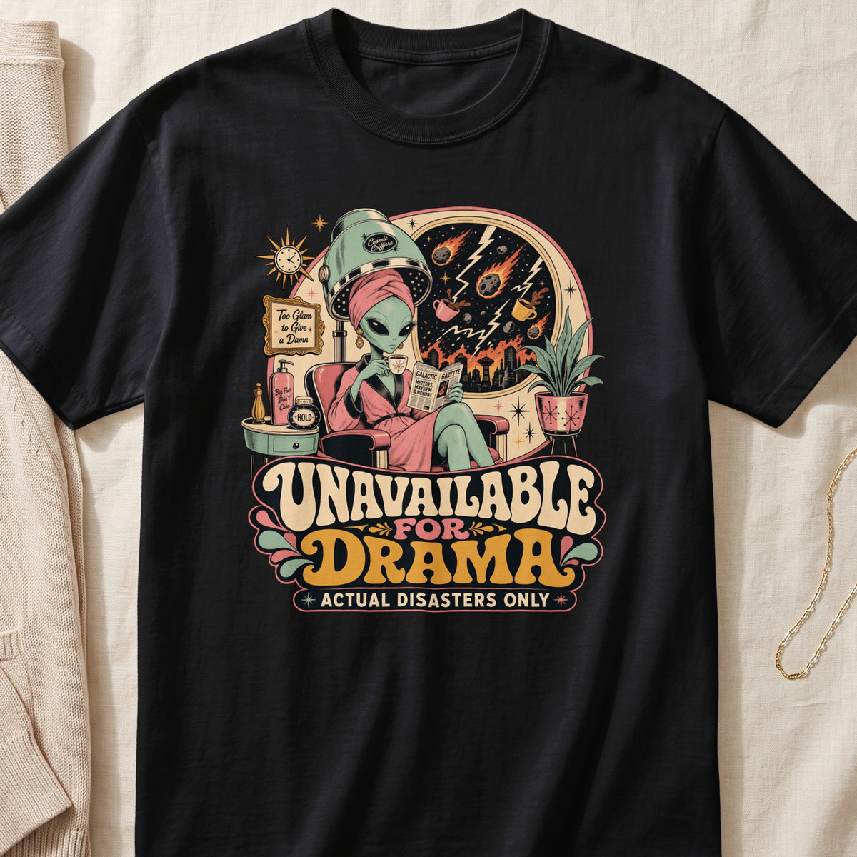 Black t-shirt with alien in hair salon reading "Unavailable for Drama."
