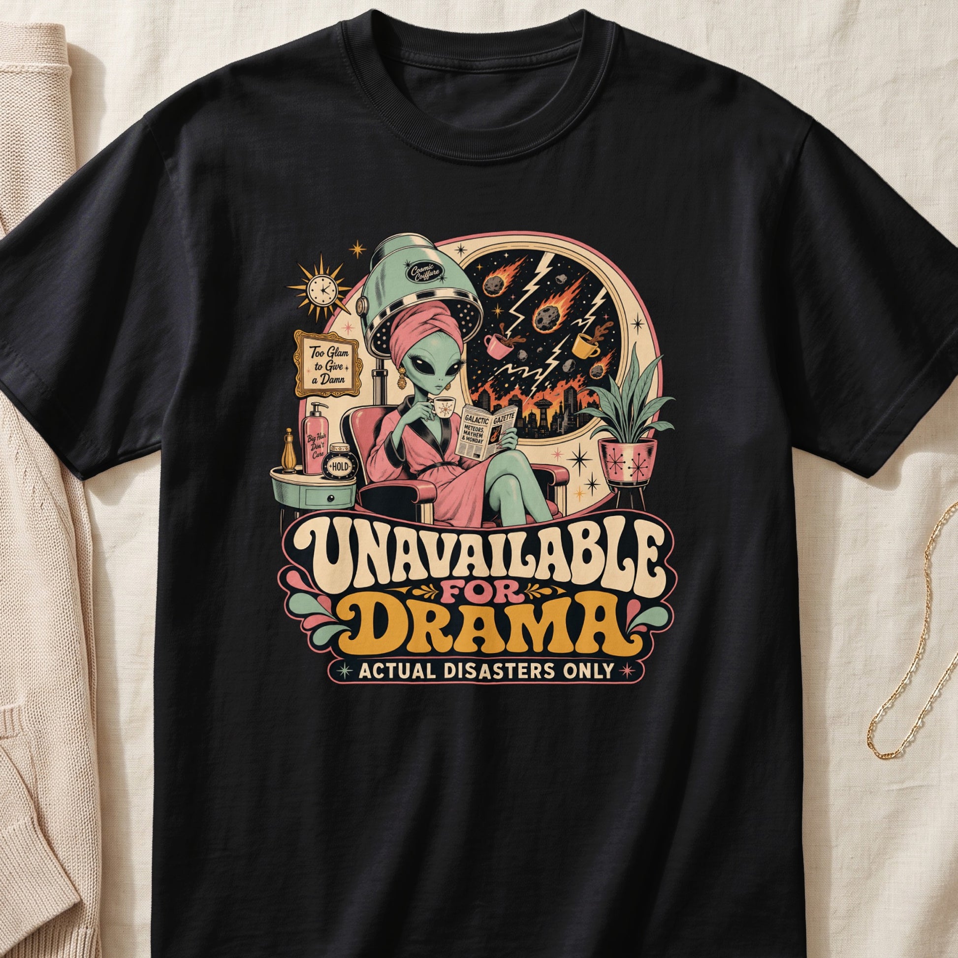 Black t-shirt with alien in hair salon reading "Unavailable for Drama."
