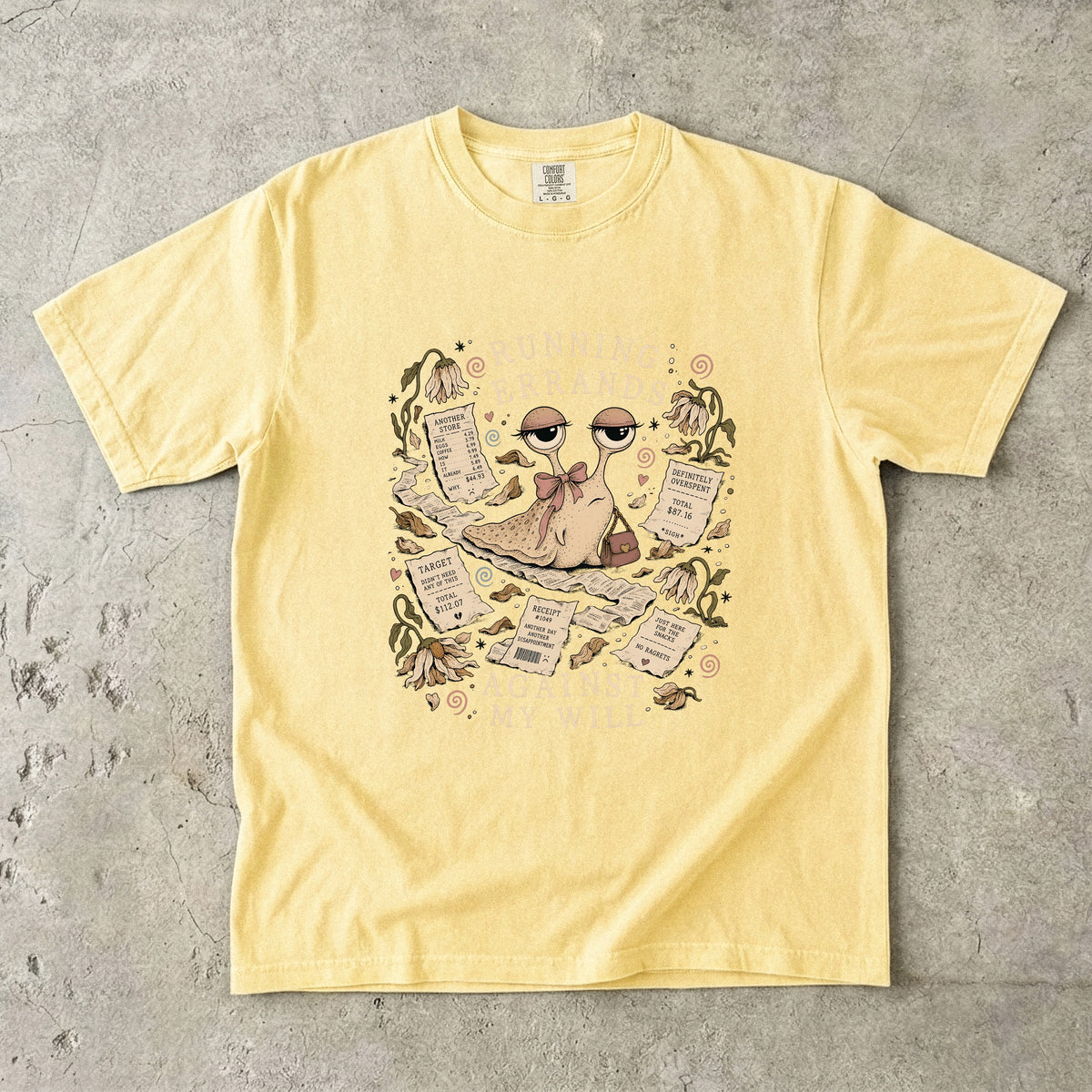 Yellow t-shirt with illustration of a snail running errands and receipts.