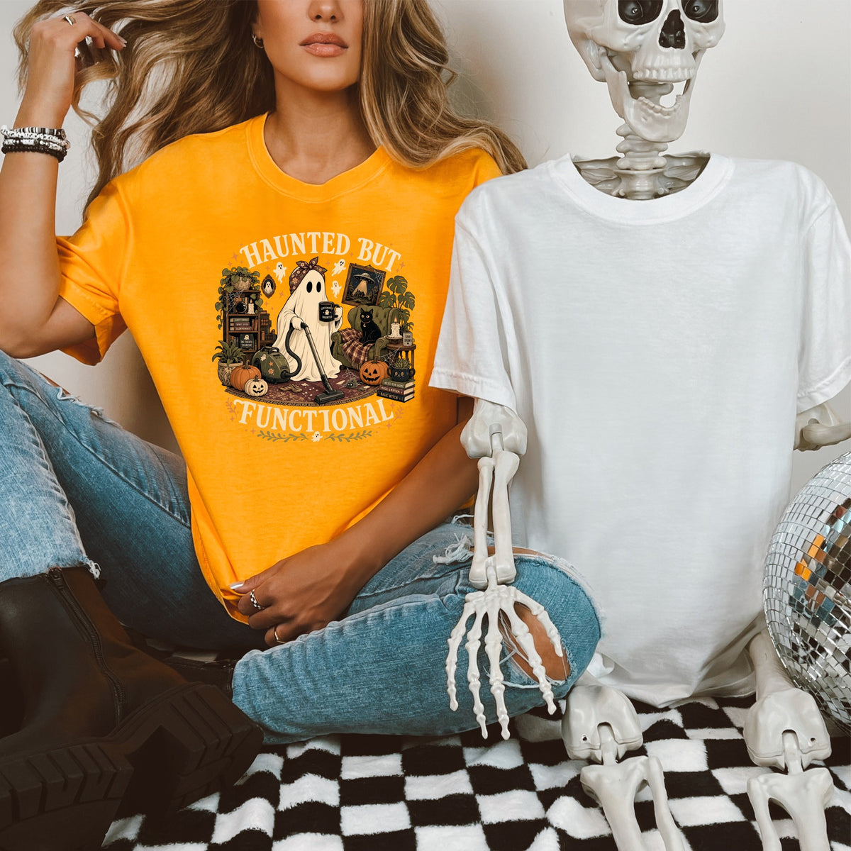 Orange t-shirt with "Haunted But Functional" ghost and Halloween graphics.