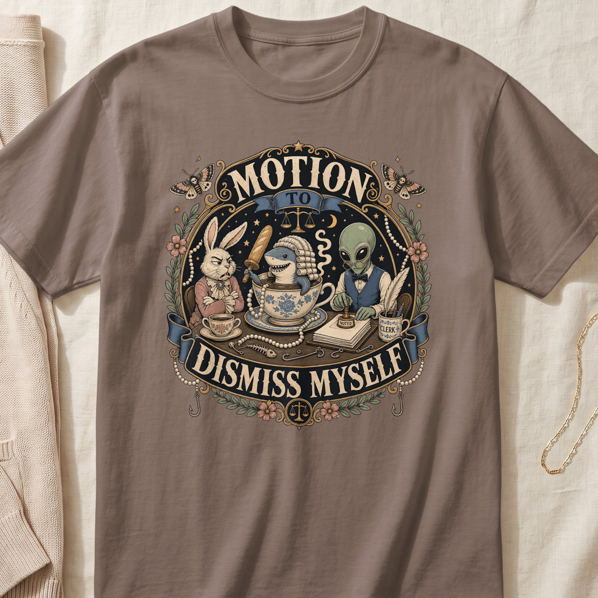 Brown crewneck t-shirt featuring a vintage courtroom illustration with a rabbit, shark in a teacup, and alien.