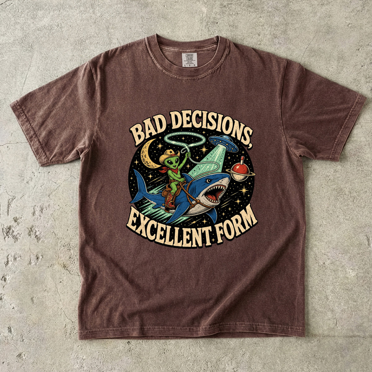 Alien cowboy riding a shark with "Bad Decisions, Excellent Form" text.