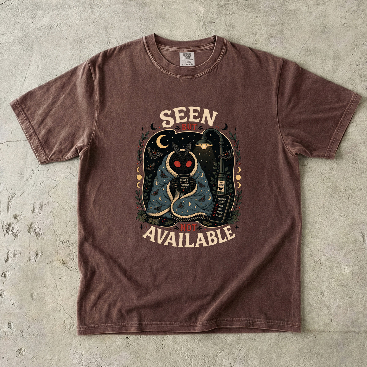 Mothman sits wrapped in a blanket with a mug, text "Seen But Not Available."