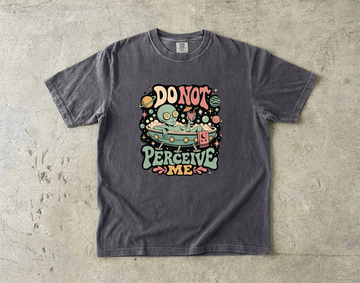 T-shirt graphic of alien in bathtub with text "DO NOT PERCEIVE ME".