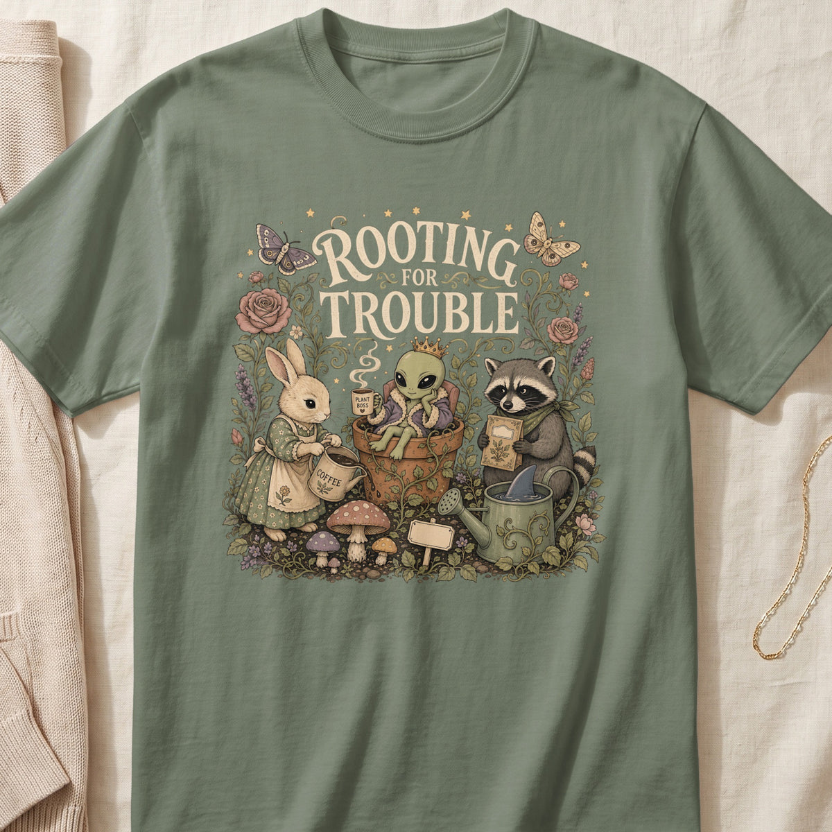 Rabbit, alien, and raccoon gardening scene with text "ROOTING FOR TROUBLE".