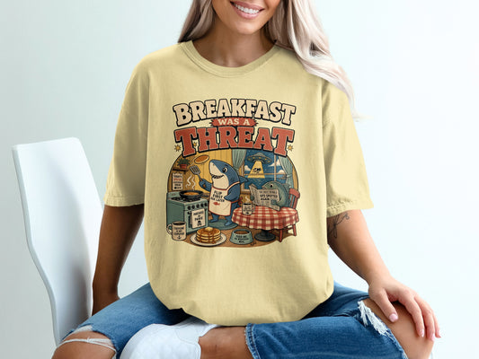 Shark cooking pancakes with text "Breakfast Was A Threat" and UFO sighting.